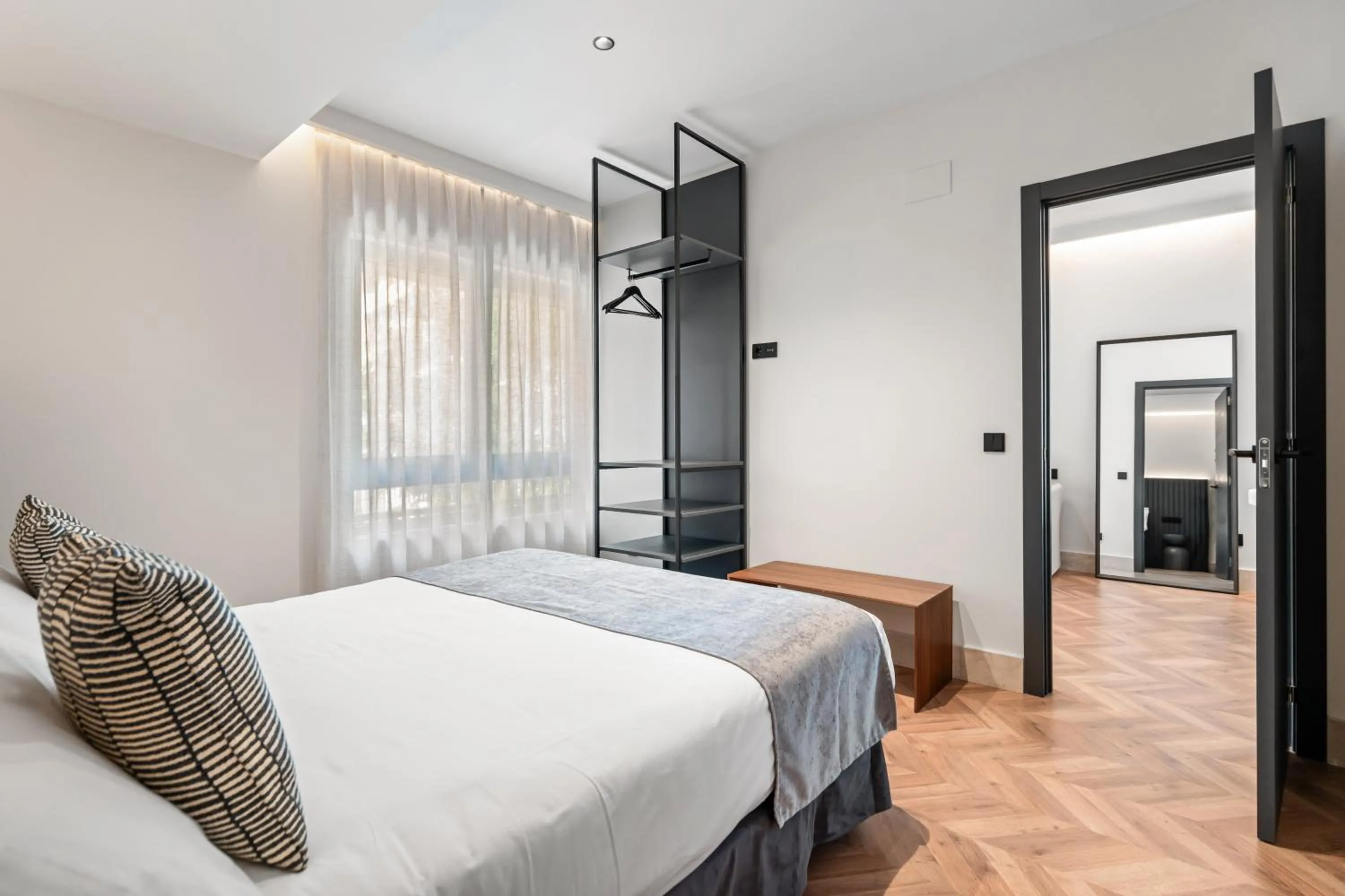 Bed in Pacifico Suites near Retiro