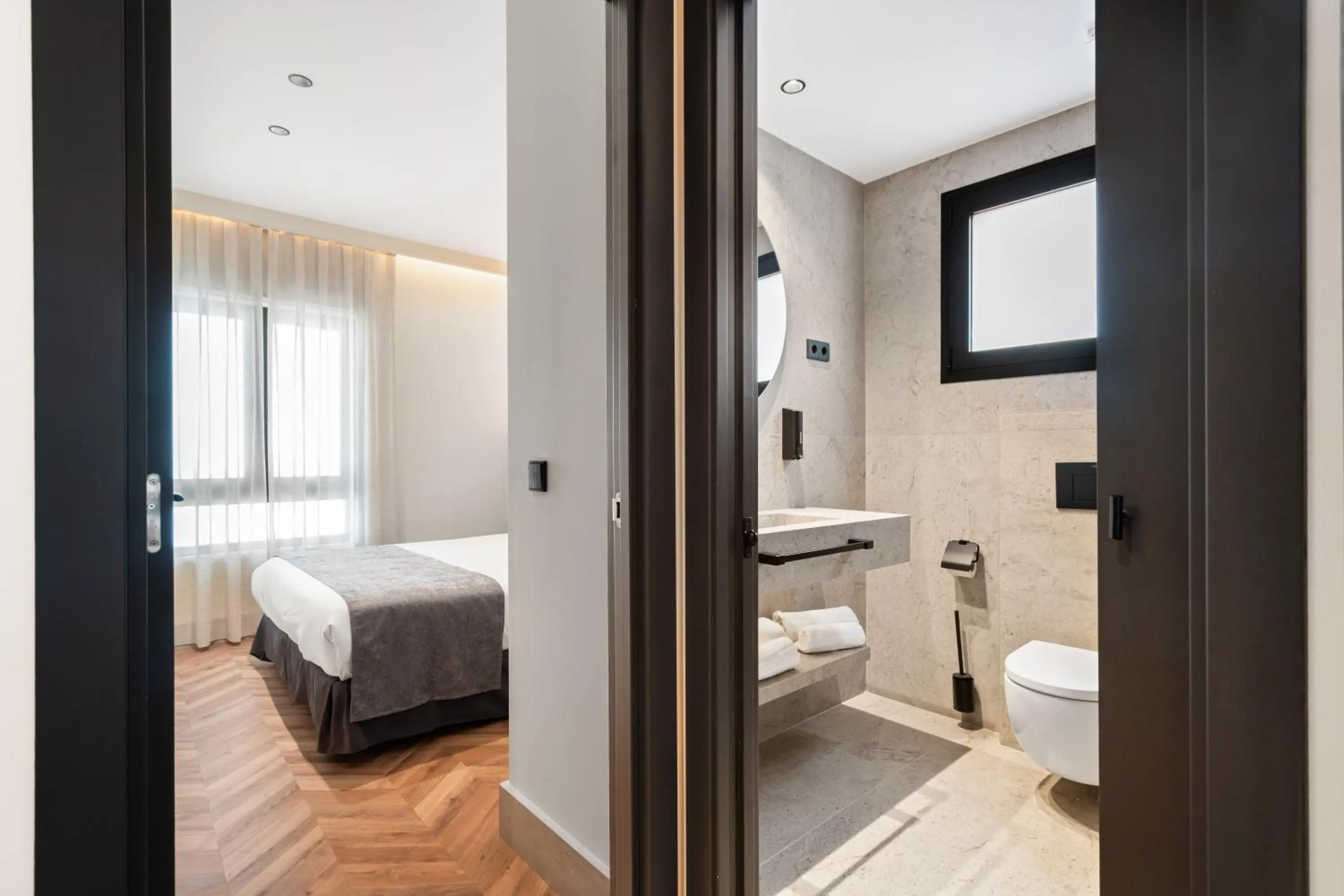 Toilet, Bed in Pacifico Suites near Retiro