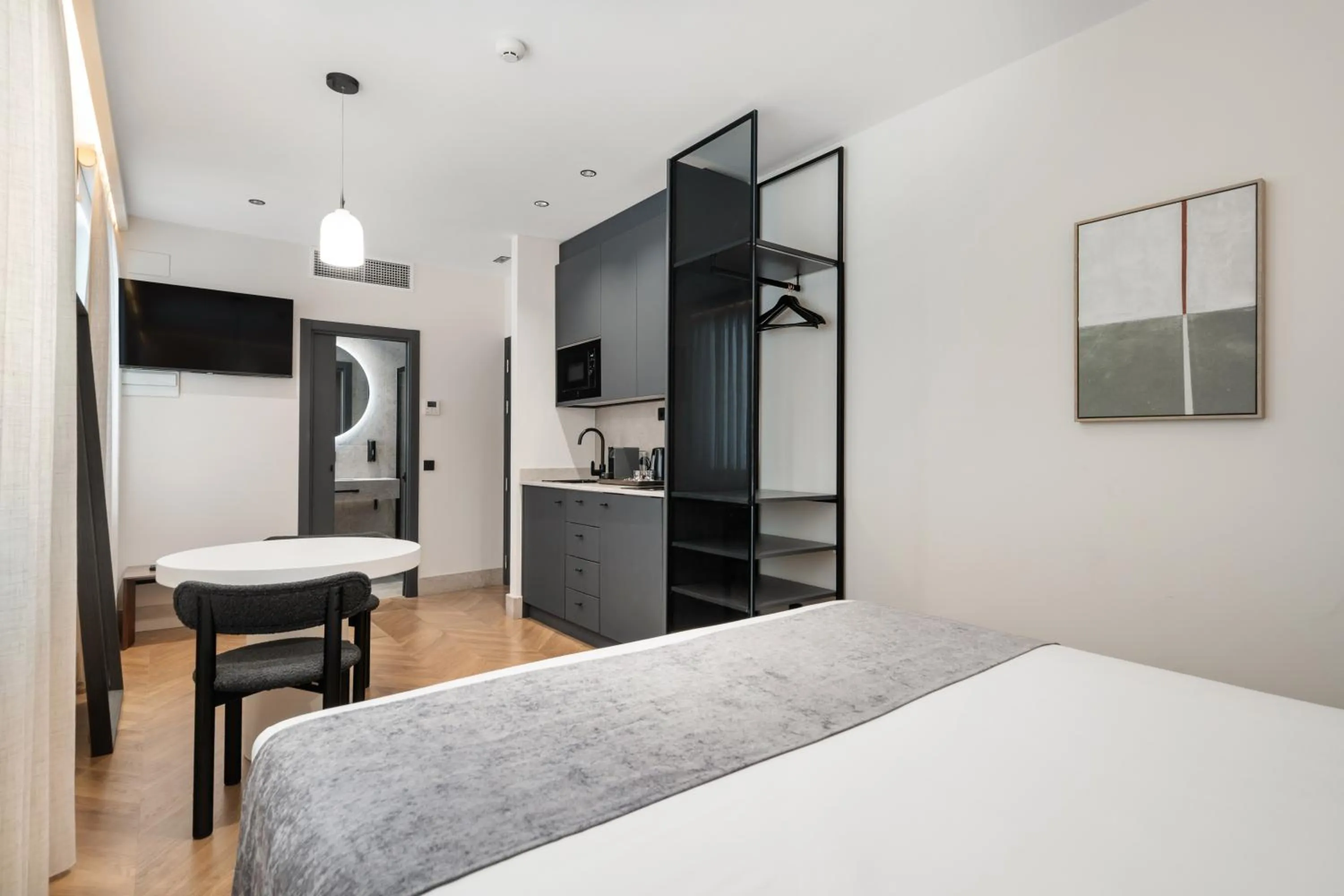 Bed in Pacifico Suites near Retiro