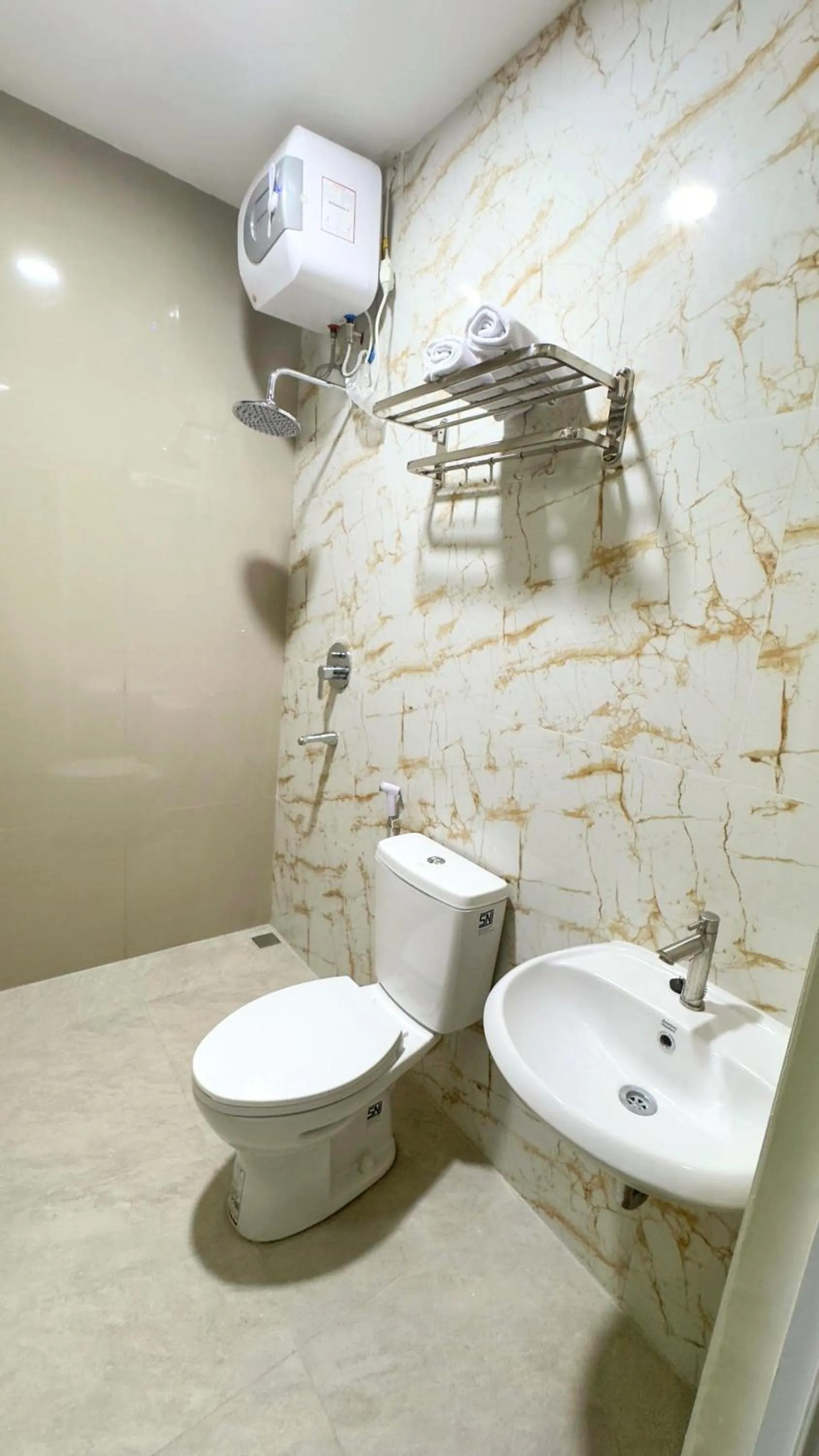 Shower in Nganjuk Family Guest House