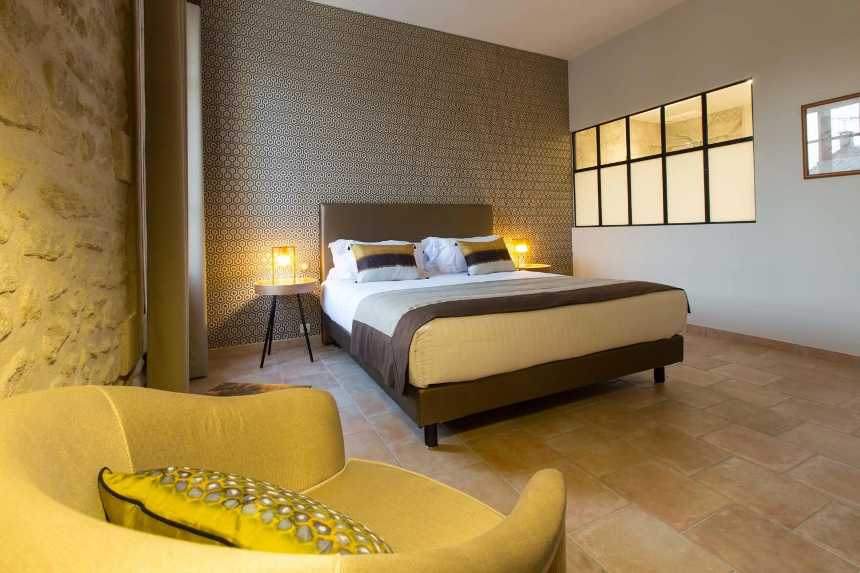 Bedroom in La Cour Des Sens