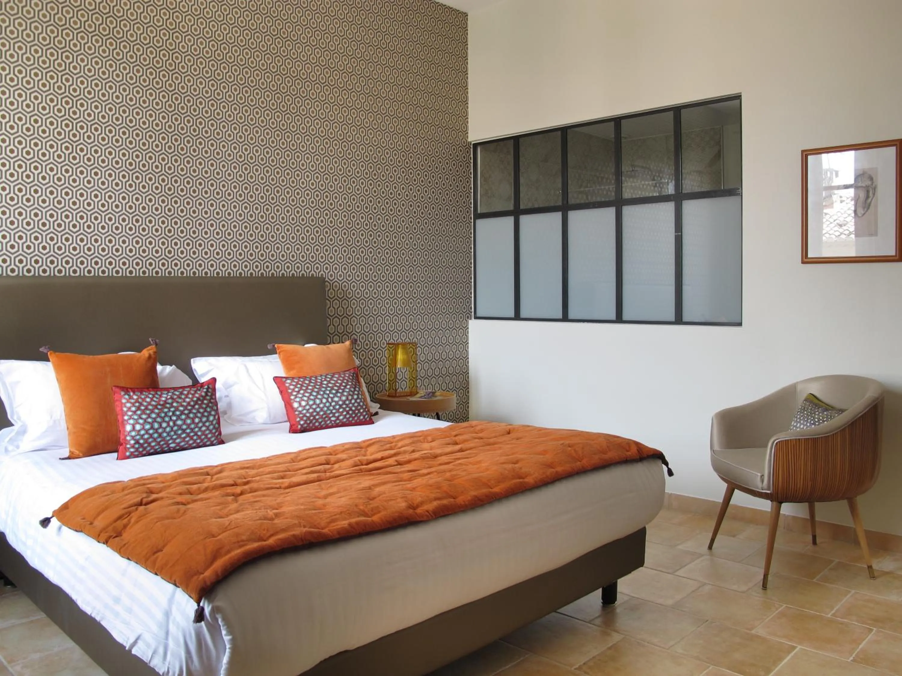 Bedroom in La Cour Des Sens