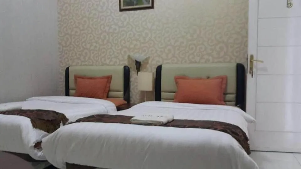 Bed in Hotel Alifa Syariah