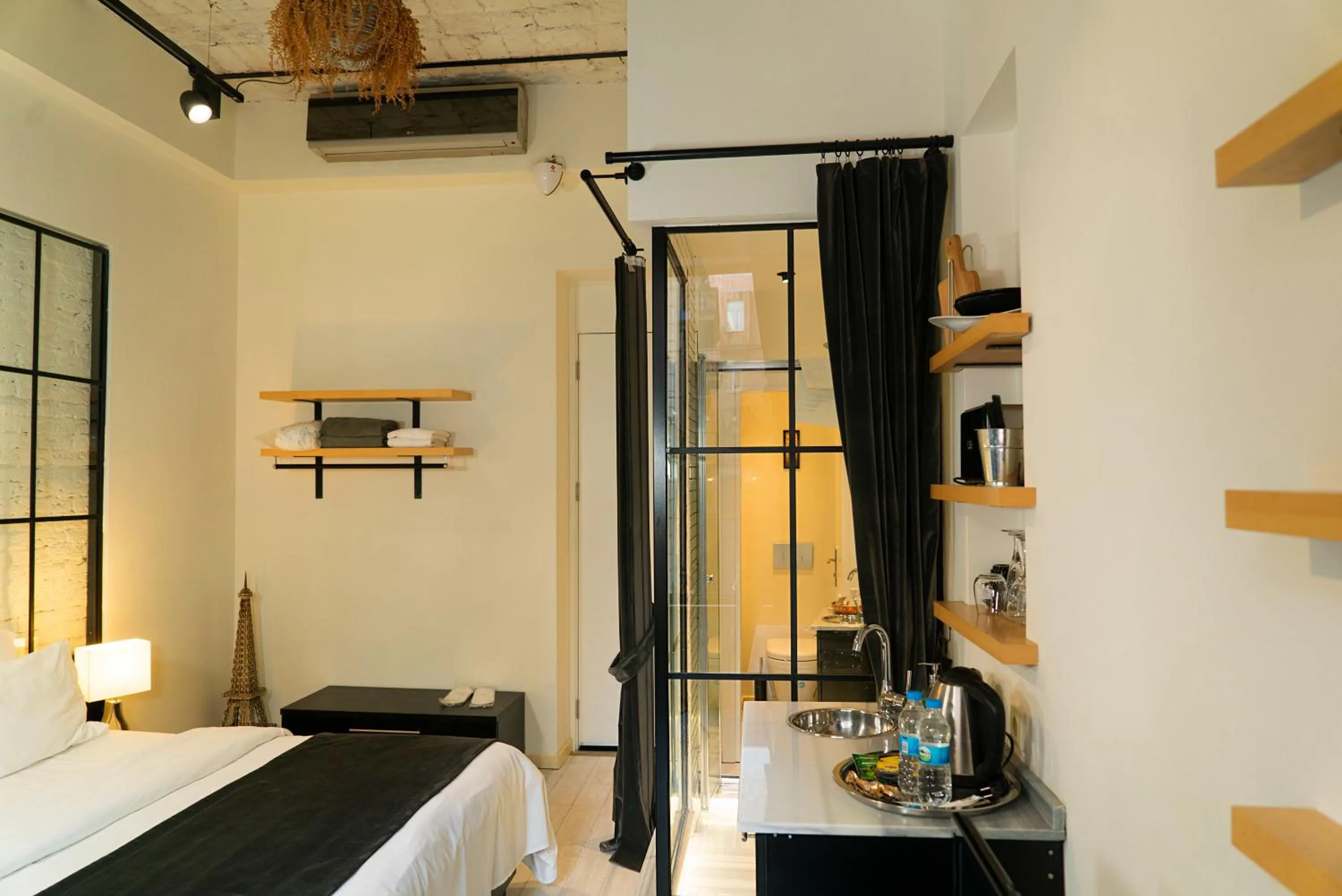 Photo of the whole room, Bed in Magnova Studios