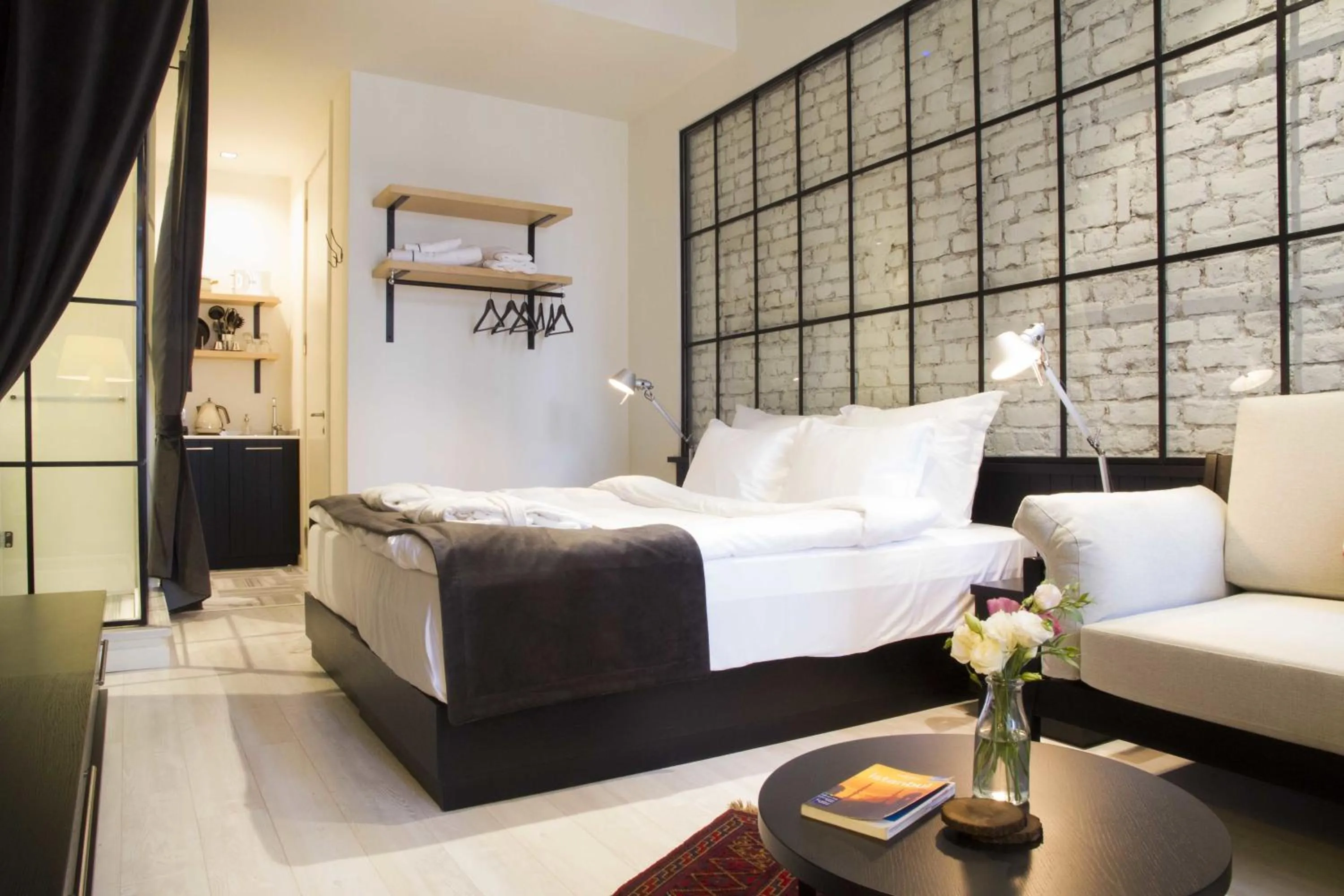 Photo of the whole room, Bed in Magnova Studios