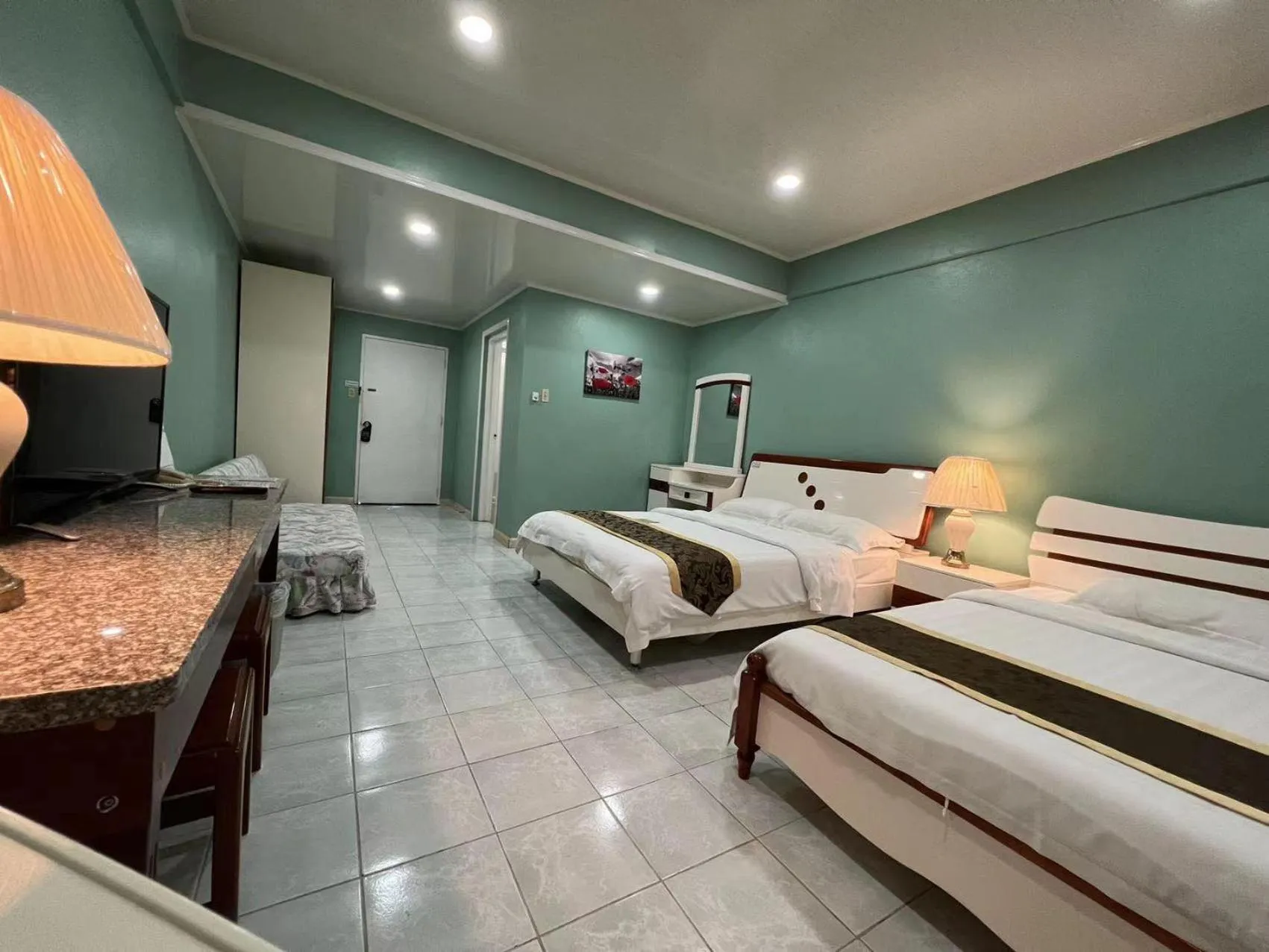 Bed in Beach Garden Hotel