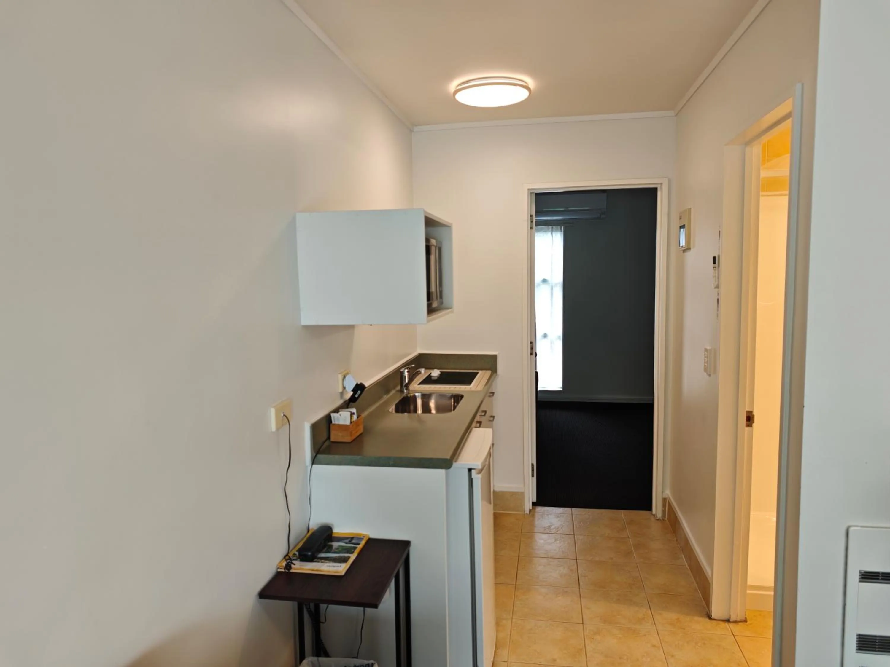 Kitchen or kitchenette in Great Lake Motel Taupo