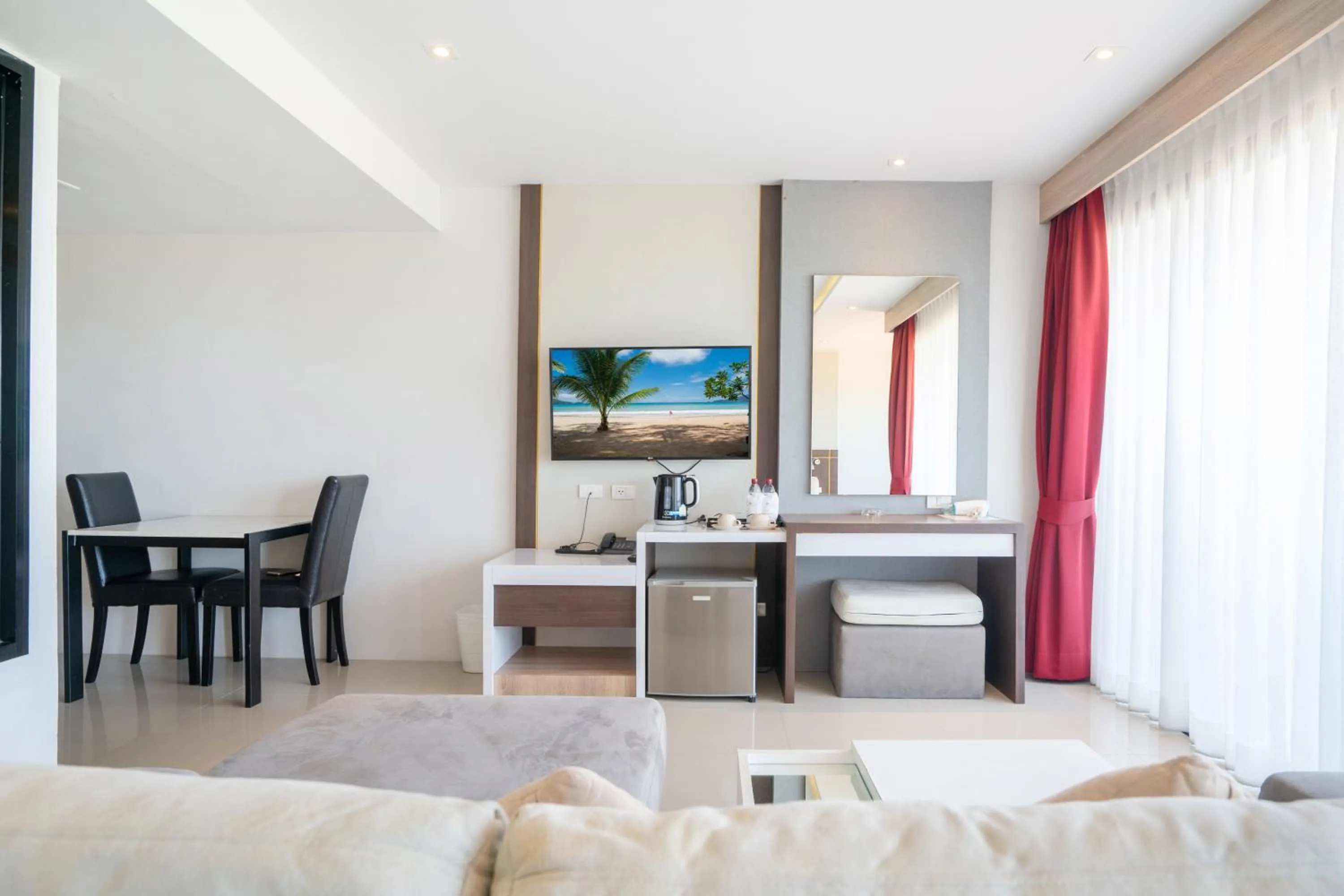 Seating area in Paripas Patong Resort