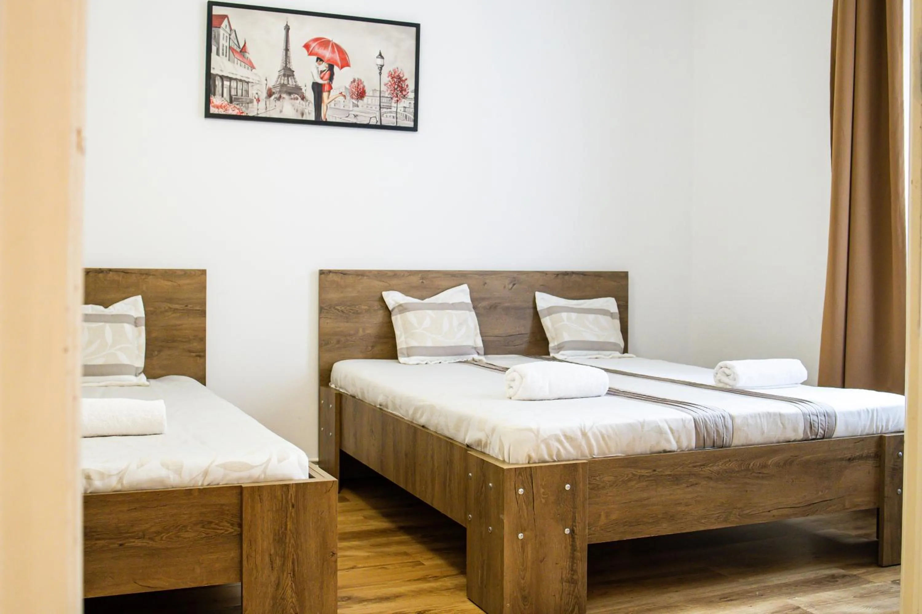 Bed in Real Apartments Lovag