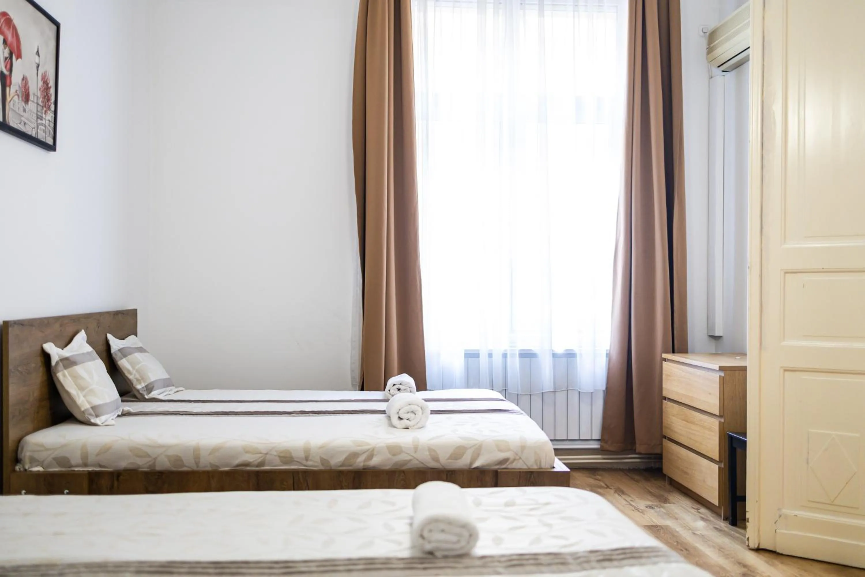 Bed in Real Apartments Lovag