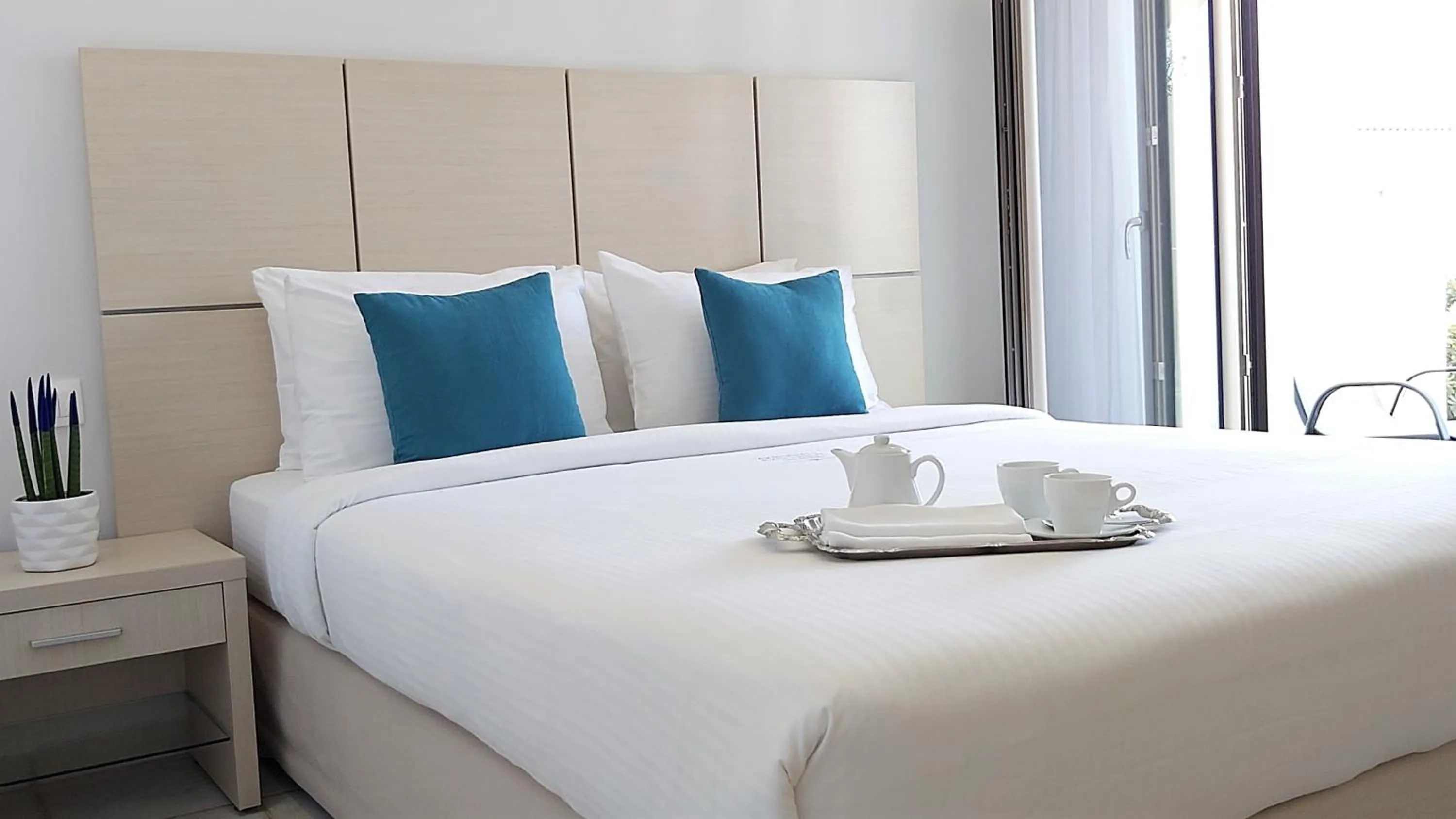 Bed in Akrogiali Exclusive Hotel (Adults Only)