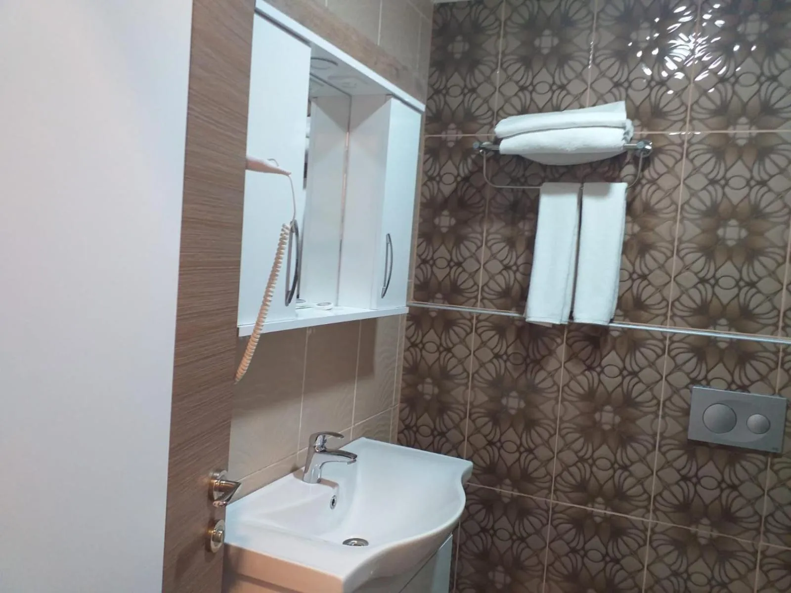 Bathroom in Dempa Hotel