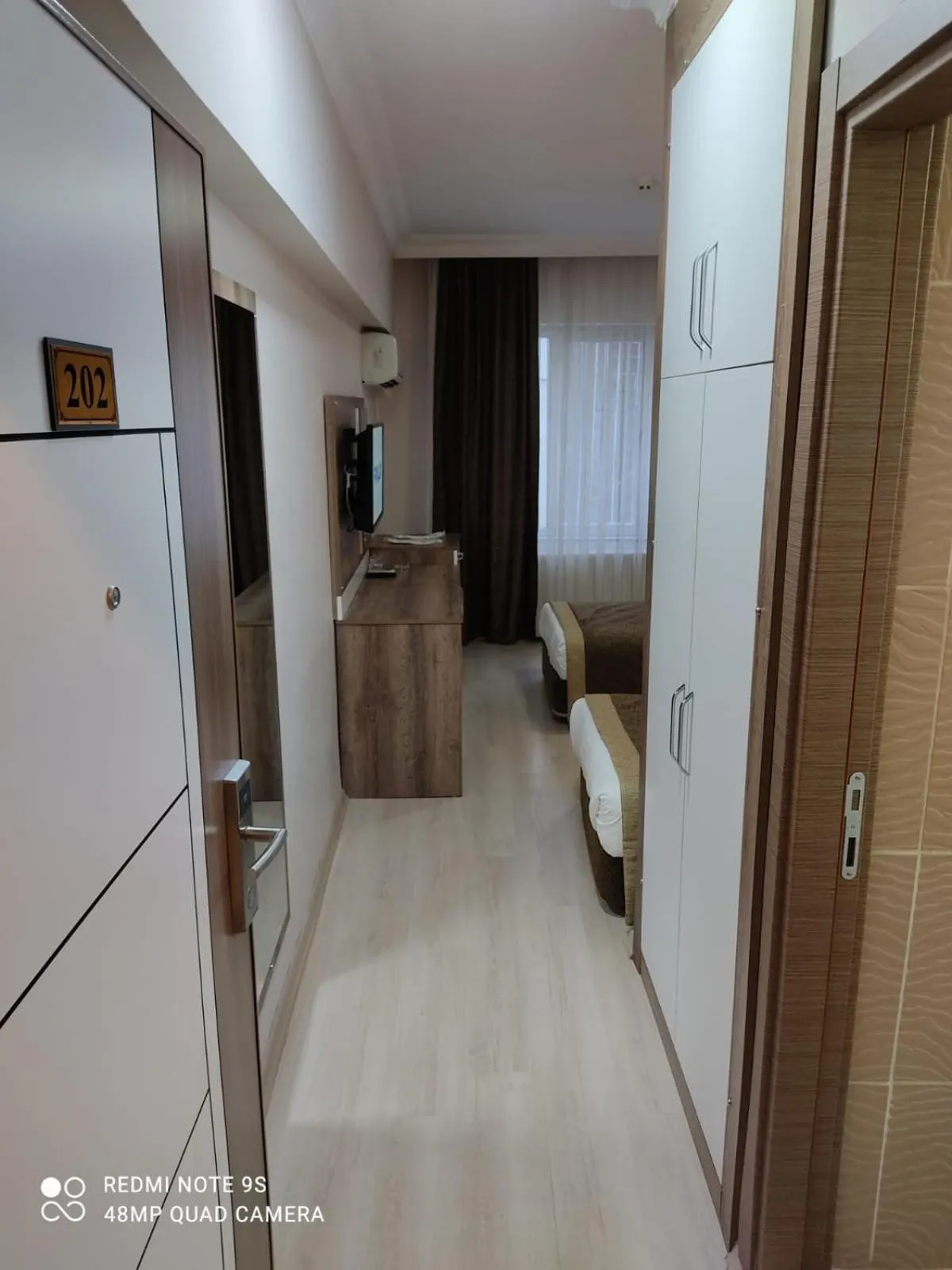 Seating area, Bed in Dempa Hotel