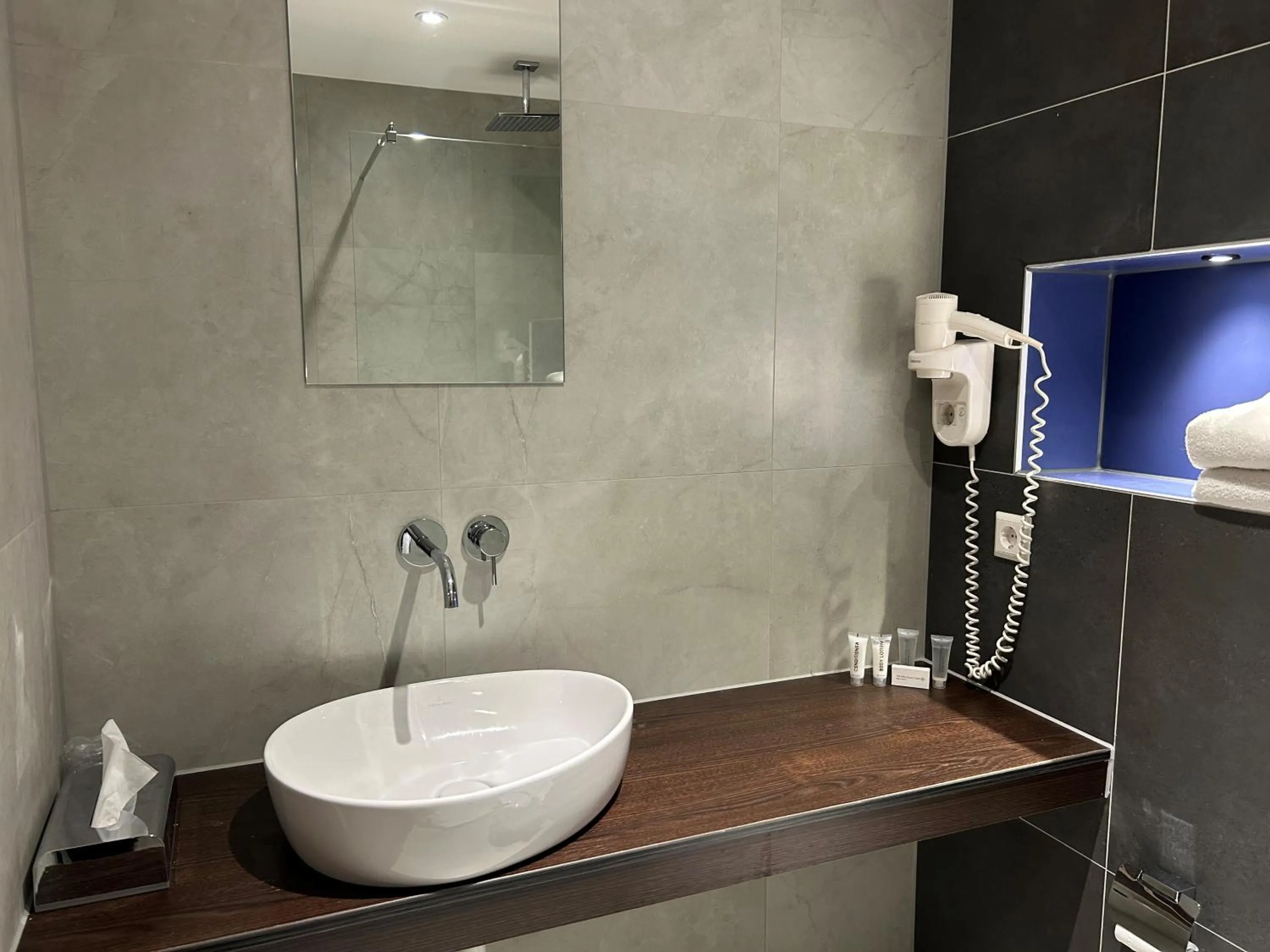 Bathroom in XO Hotels Blue Square