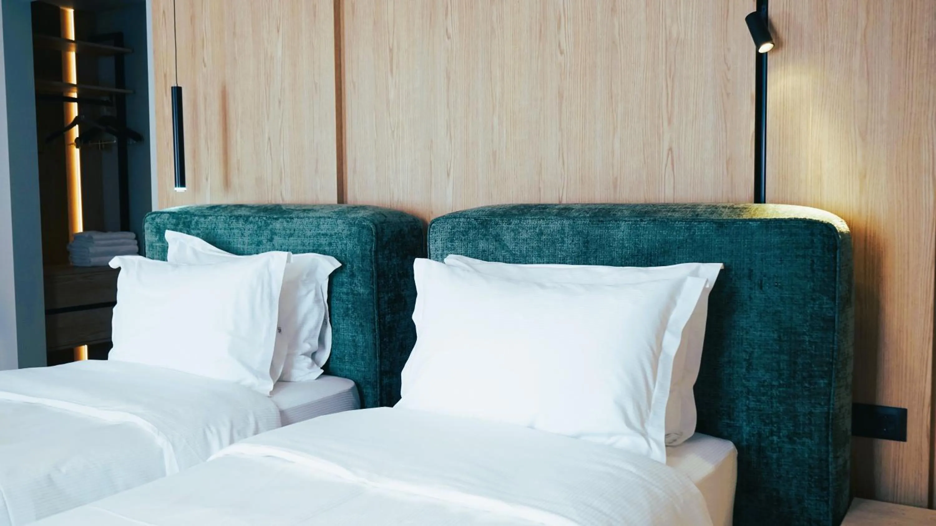 Bed in Arbnor Boutique Hotel