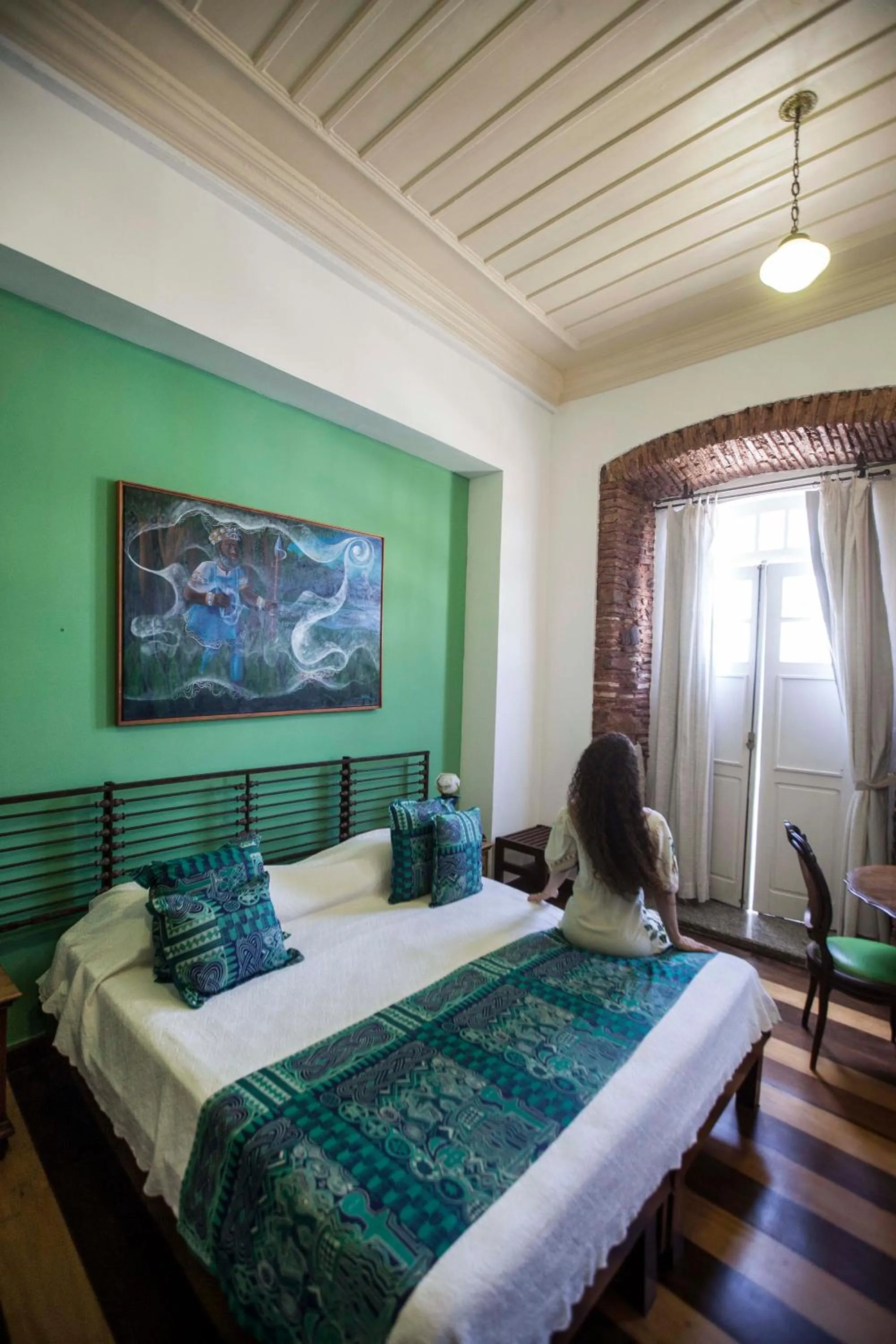 Bed in Pousada Solar dos Deuses