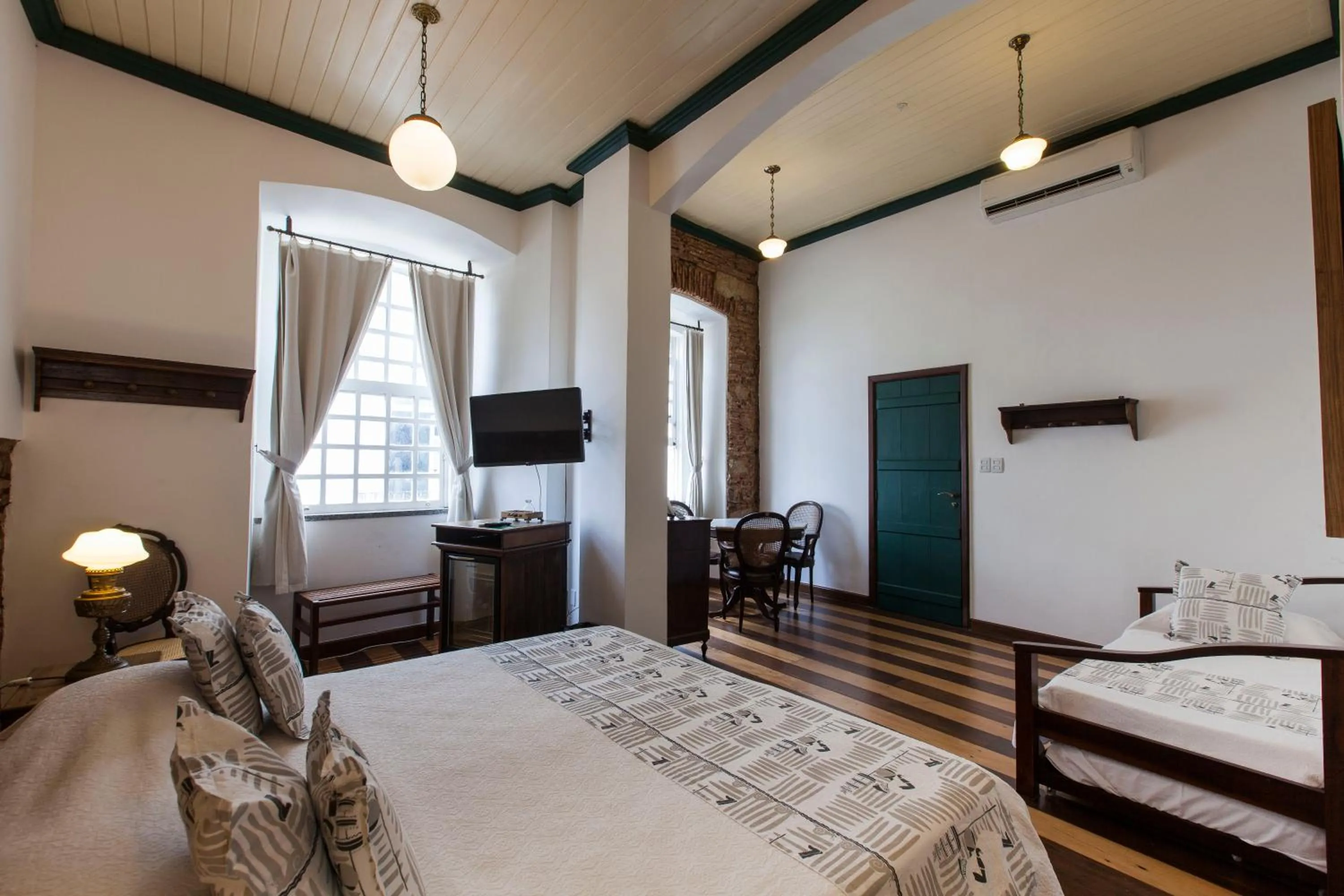 Bed in Pousada Solar dos Deuses