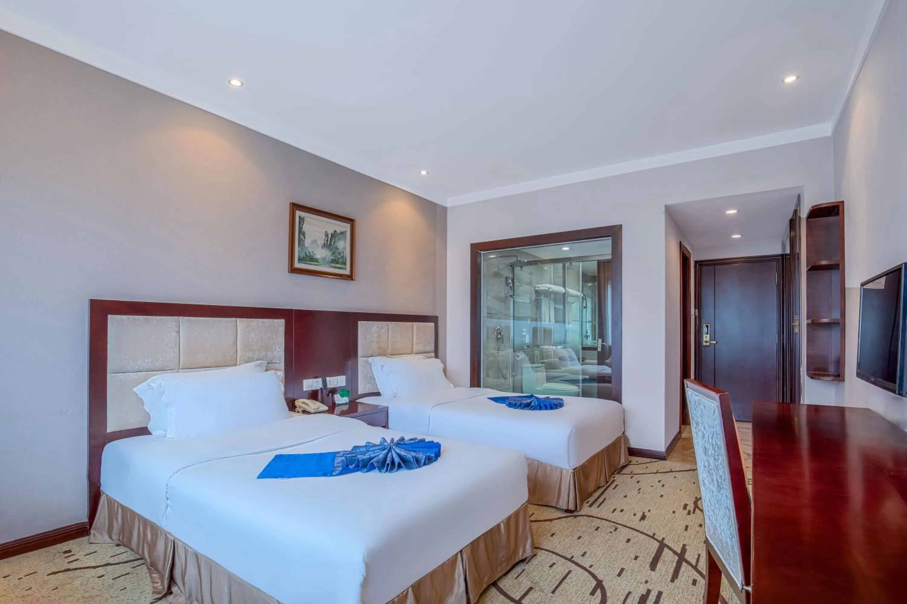 Bed in Zhangjiajie International Hotel