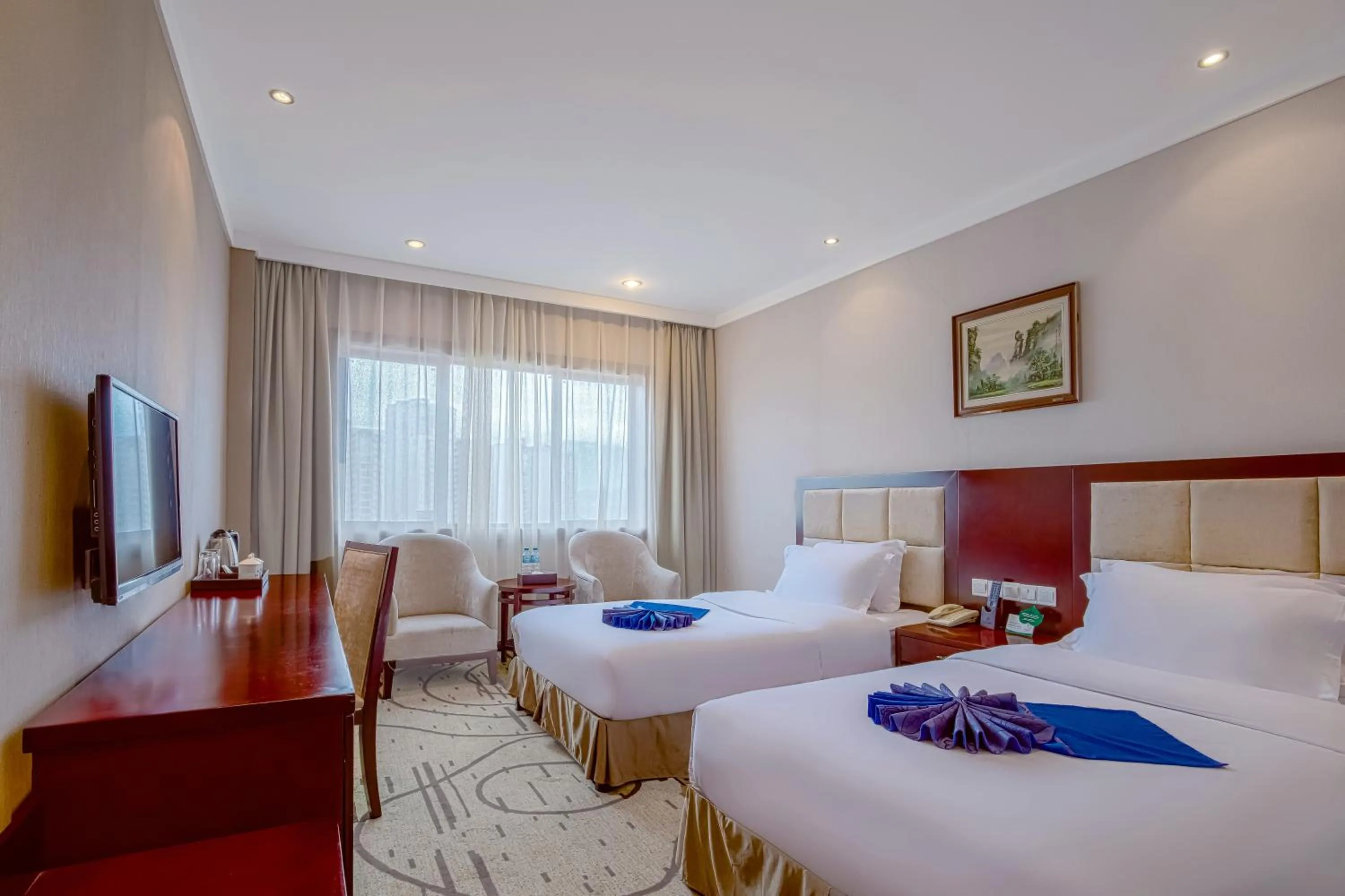 Bed in Zhangjiajie International Hotel