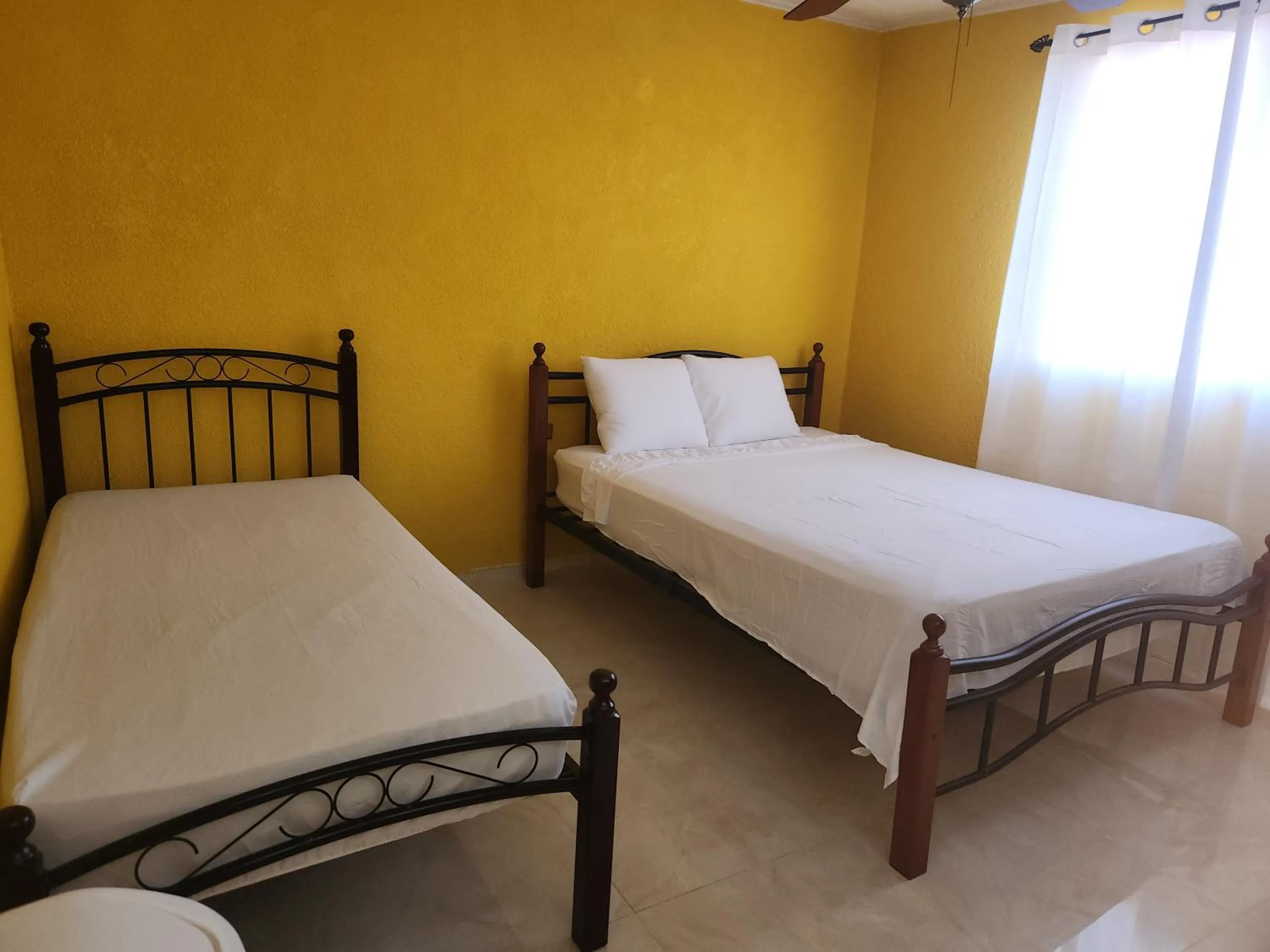 Bed in EL REY Hotel & Restaurant