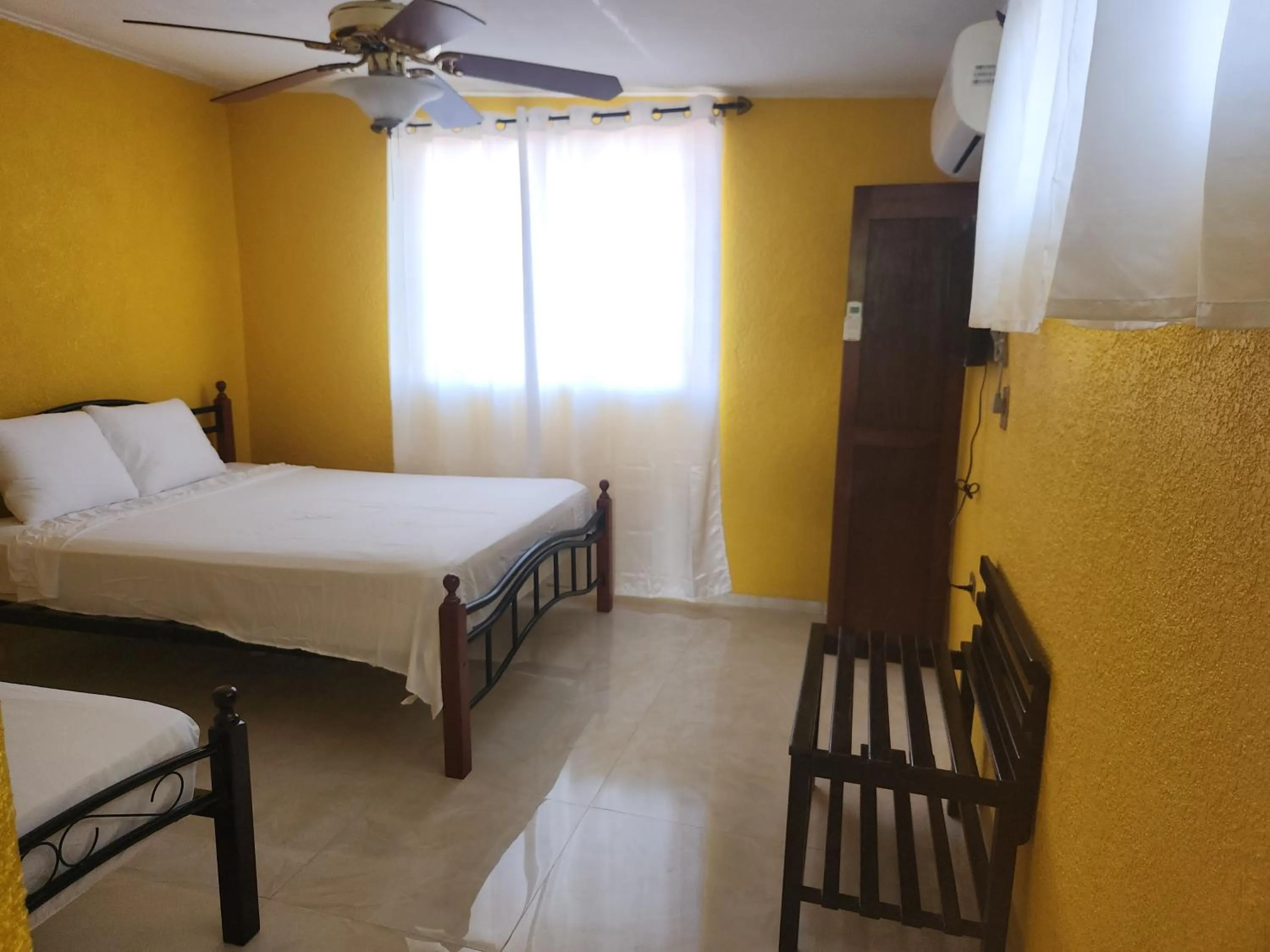 Bed in EL REY Hotel & Restaurant