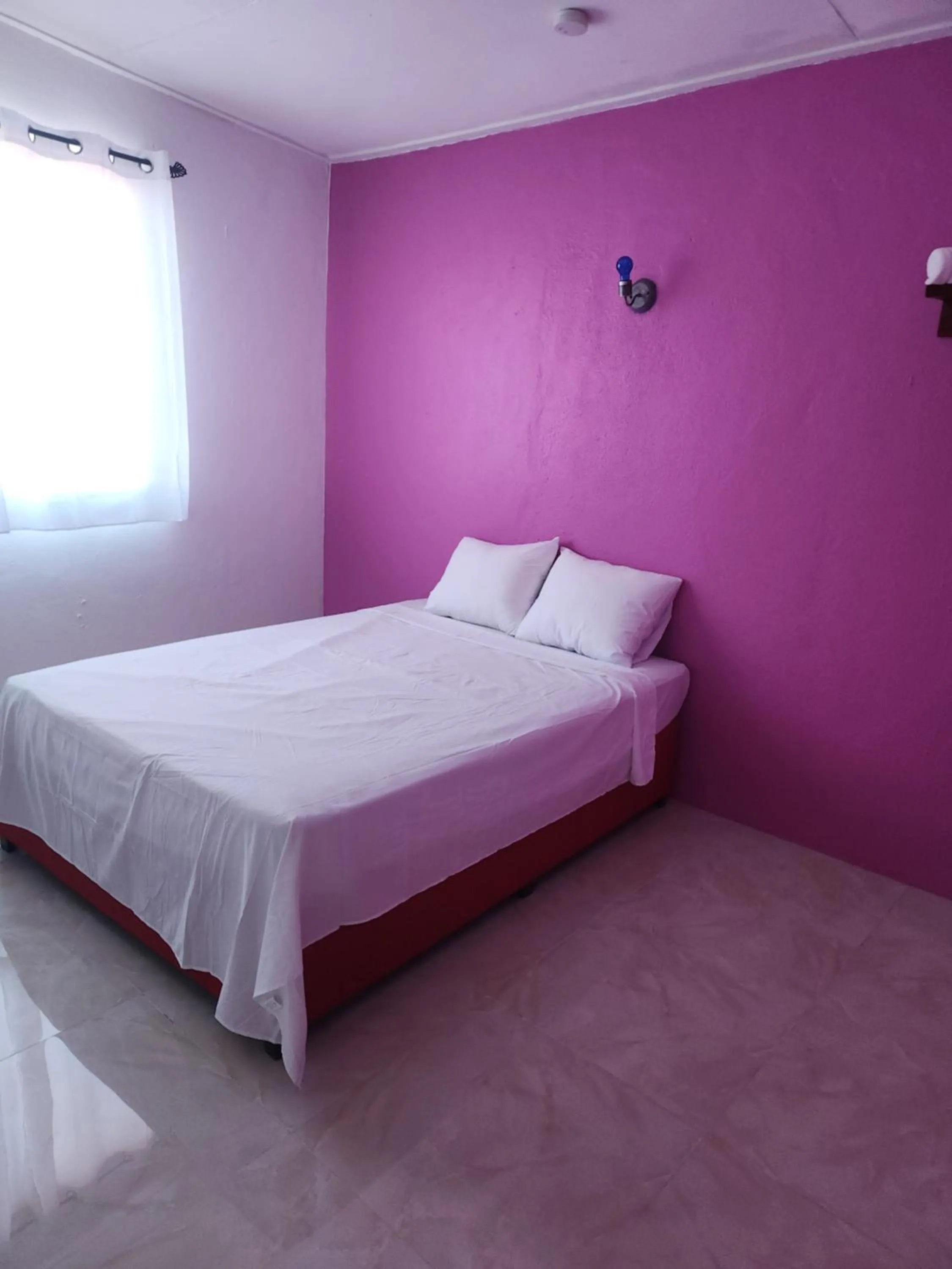 Bed in EL REY Hotel & Restaurant