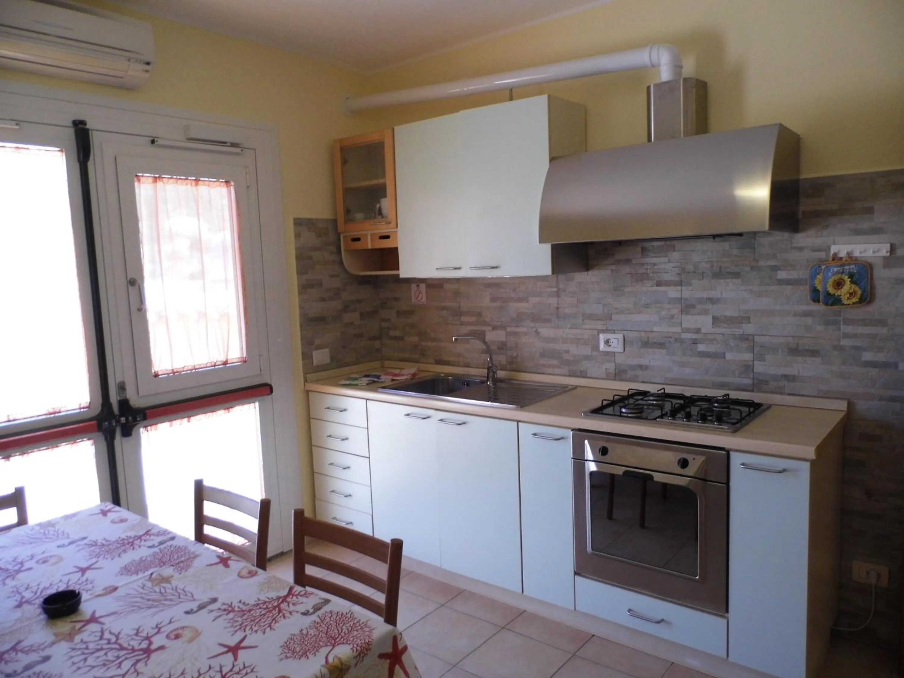 Kitchen or kitchenette in Le Nereidi Hotel & Residence