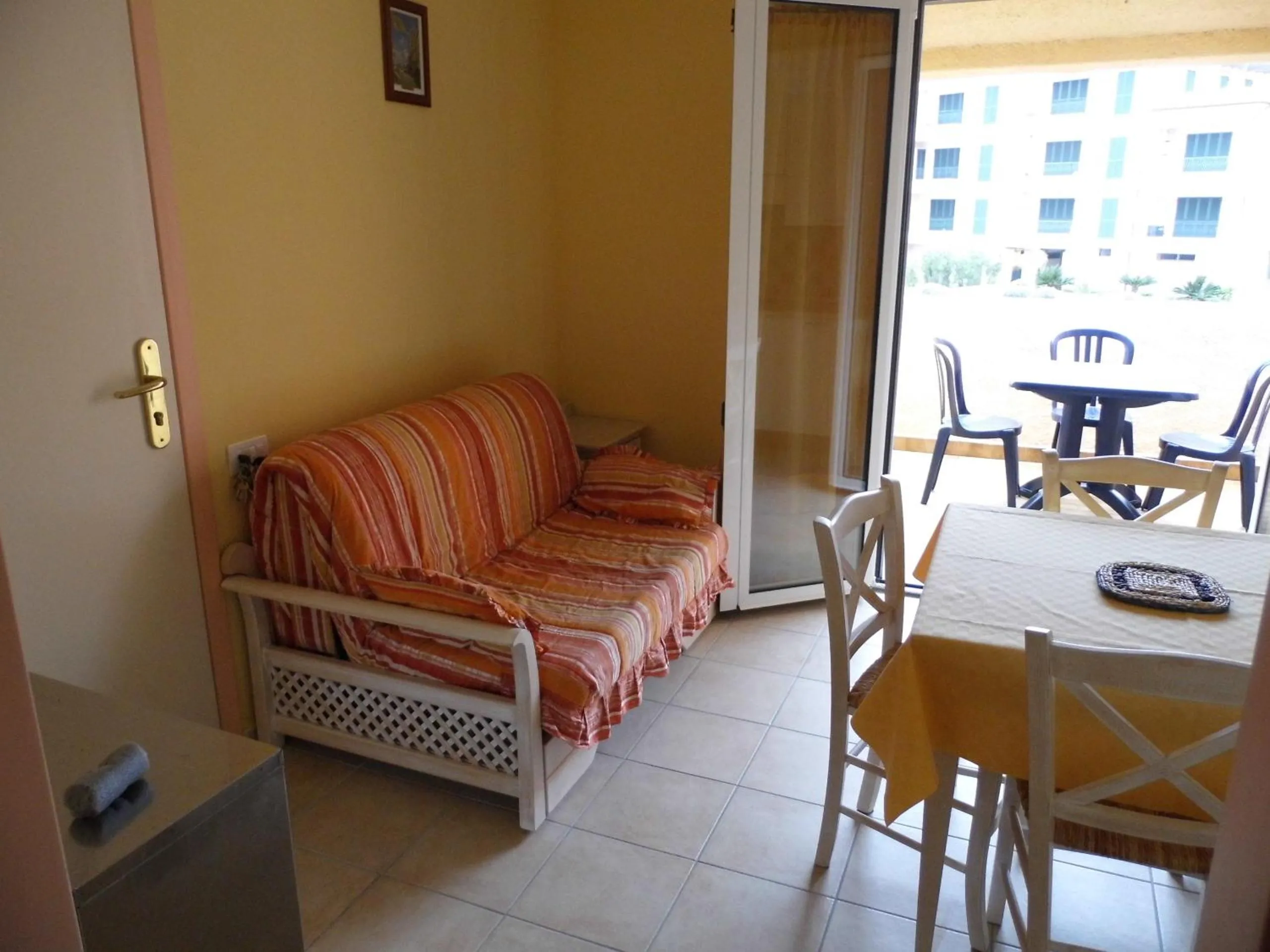 Living room, Bed in Le Nereidi Hotel & Residence