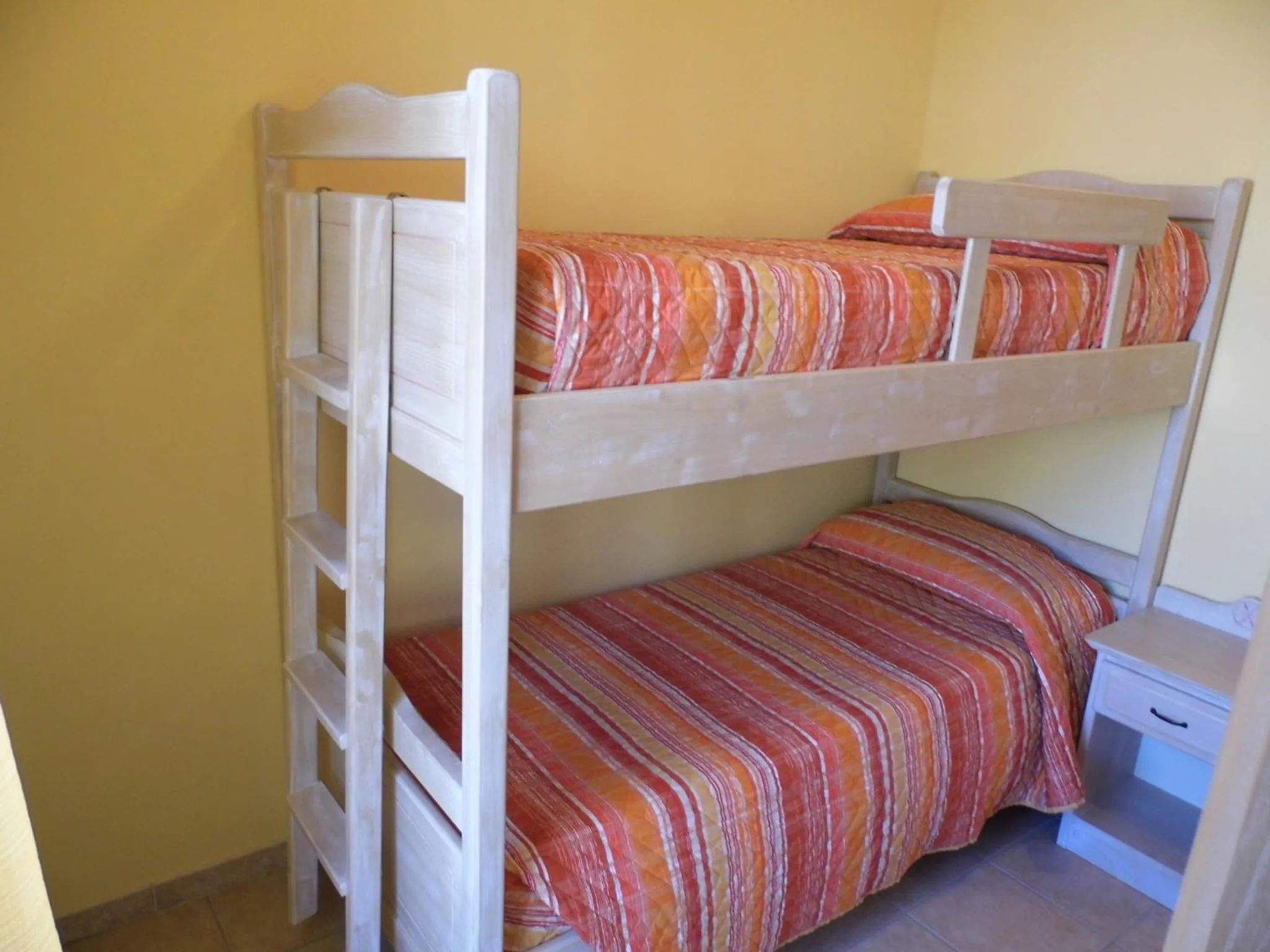 Bed in Le Nereidi Hotel & Residence