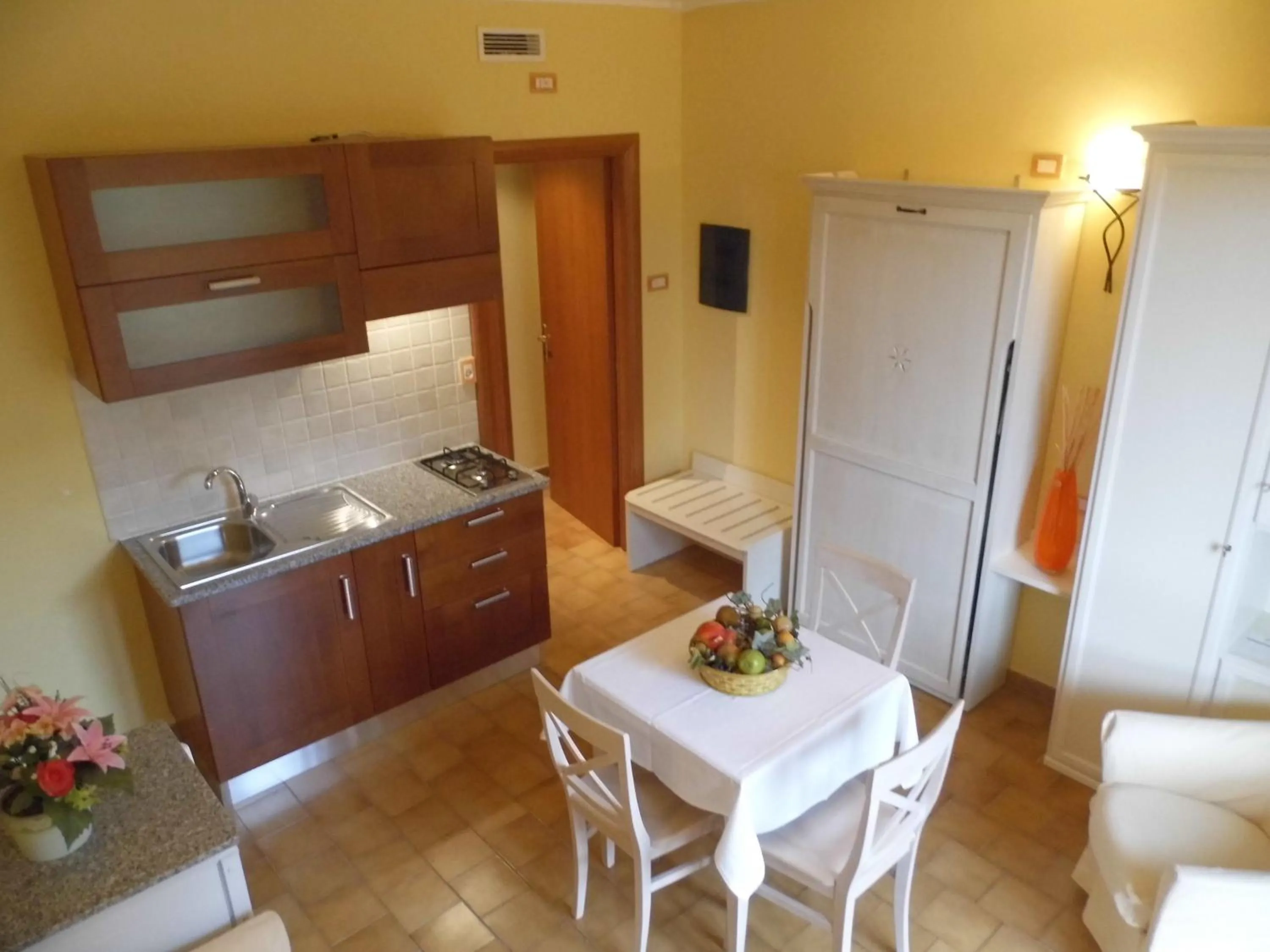 Kitchen or kitchenette in Le Nereidi Hotel & Residence
