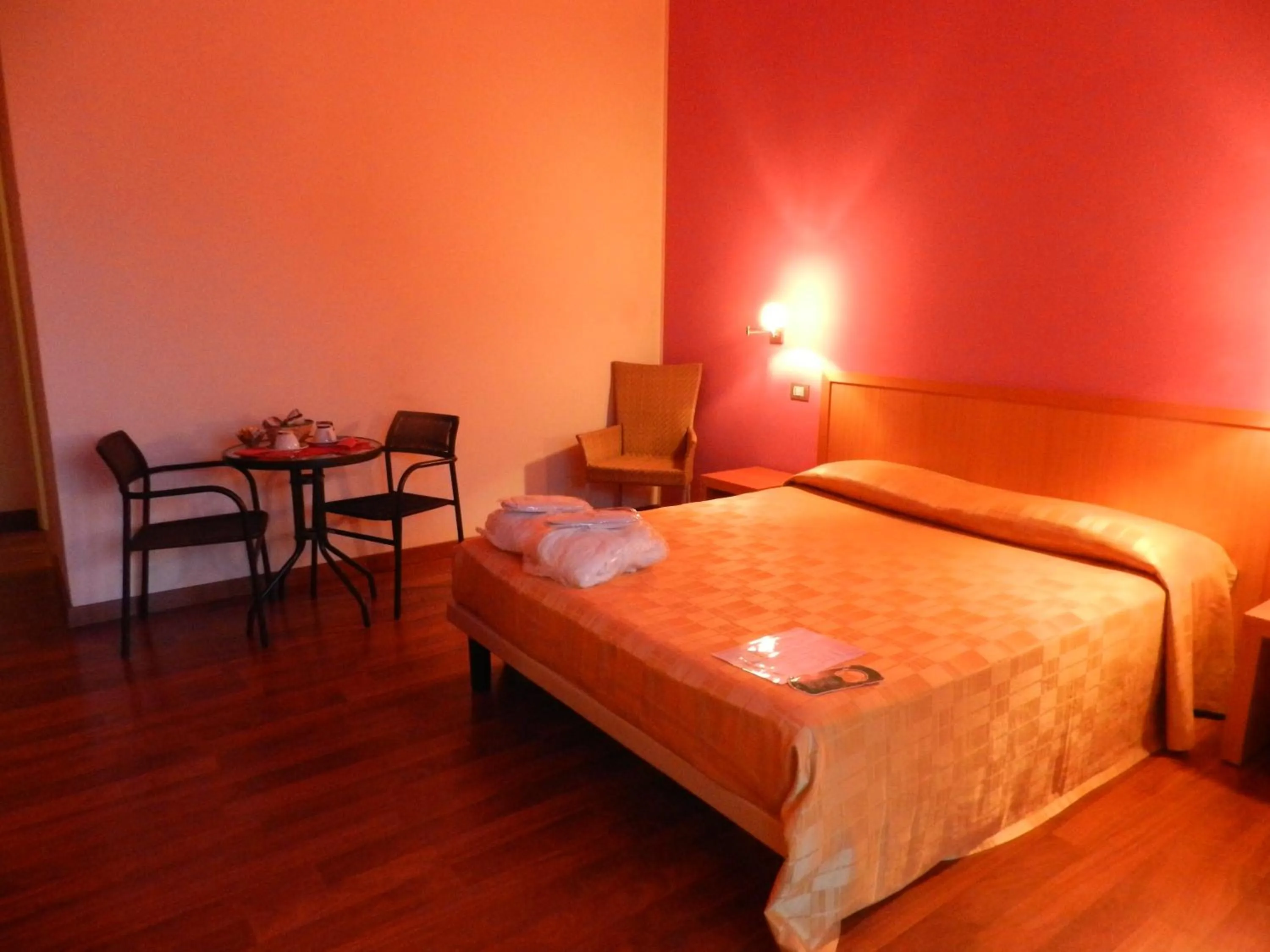 Photo of the whole room, Bed in Hotel I Colori