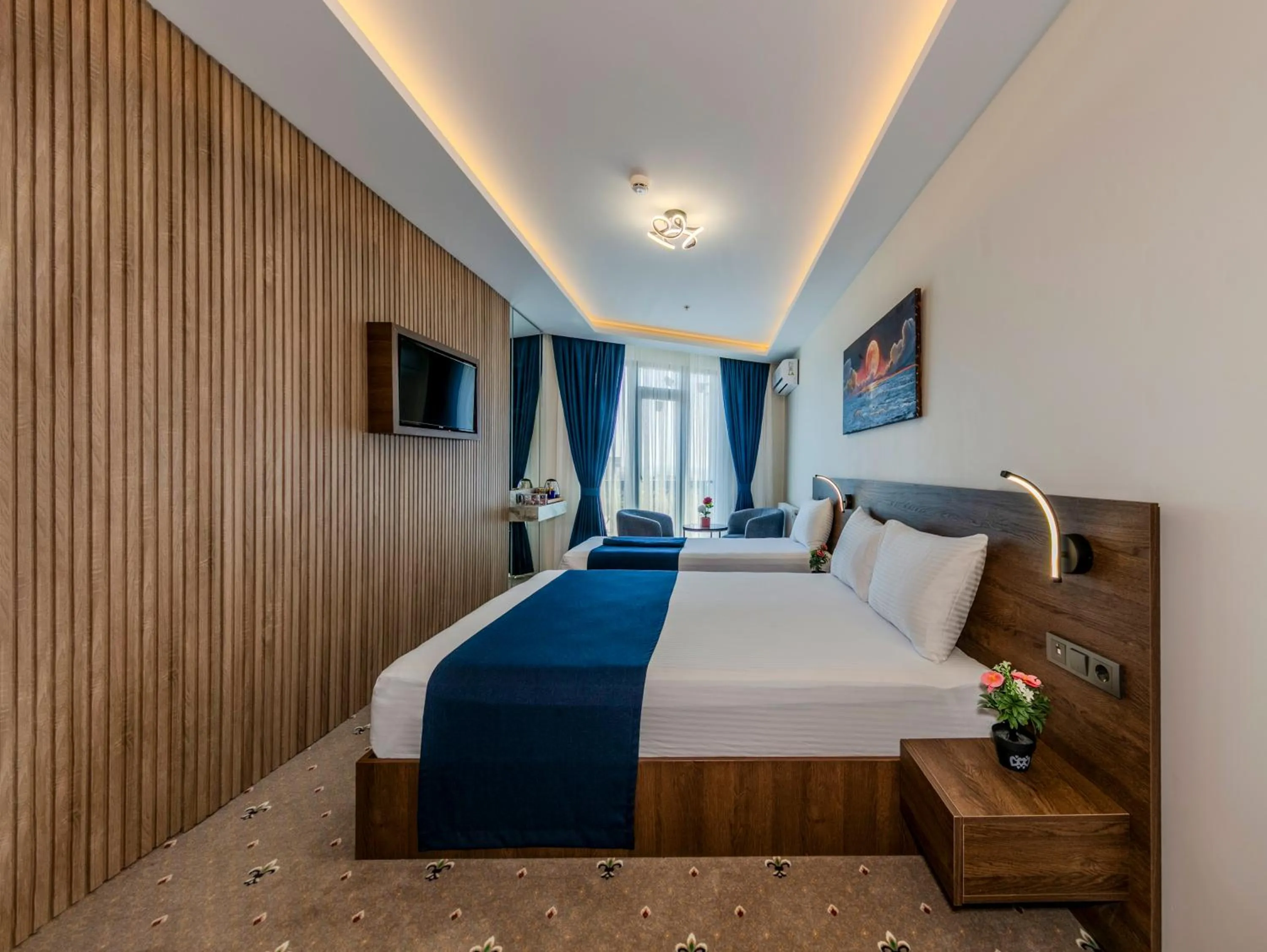 Communal lounge/ TV room, Bed in Airport Waves Hotel