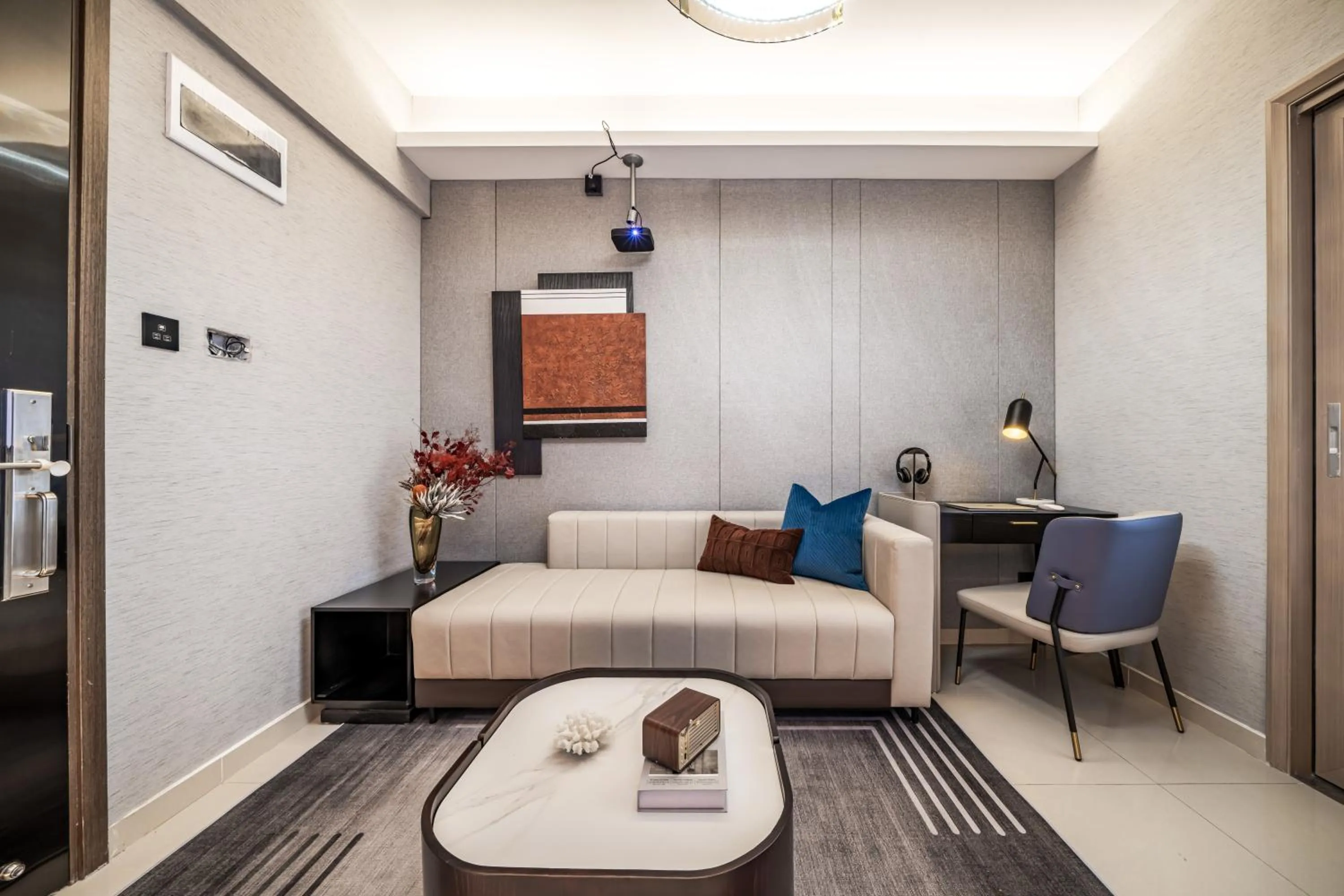 Living room, Bed in Kingkey Shuibei International Apartment Hotel