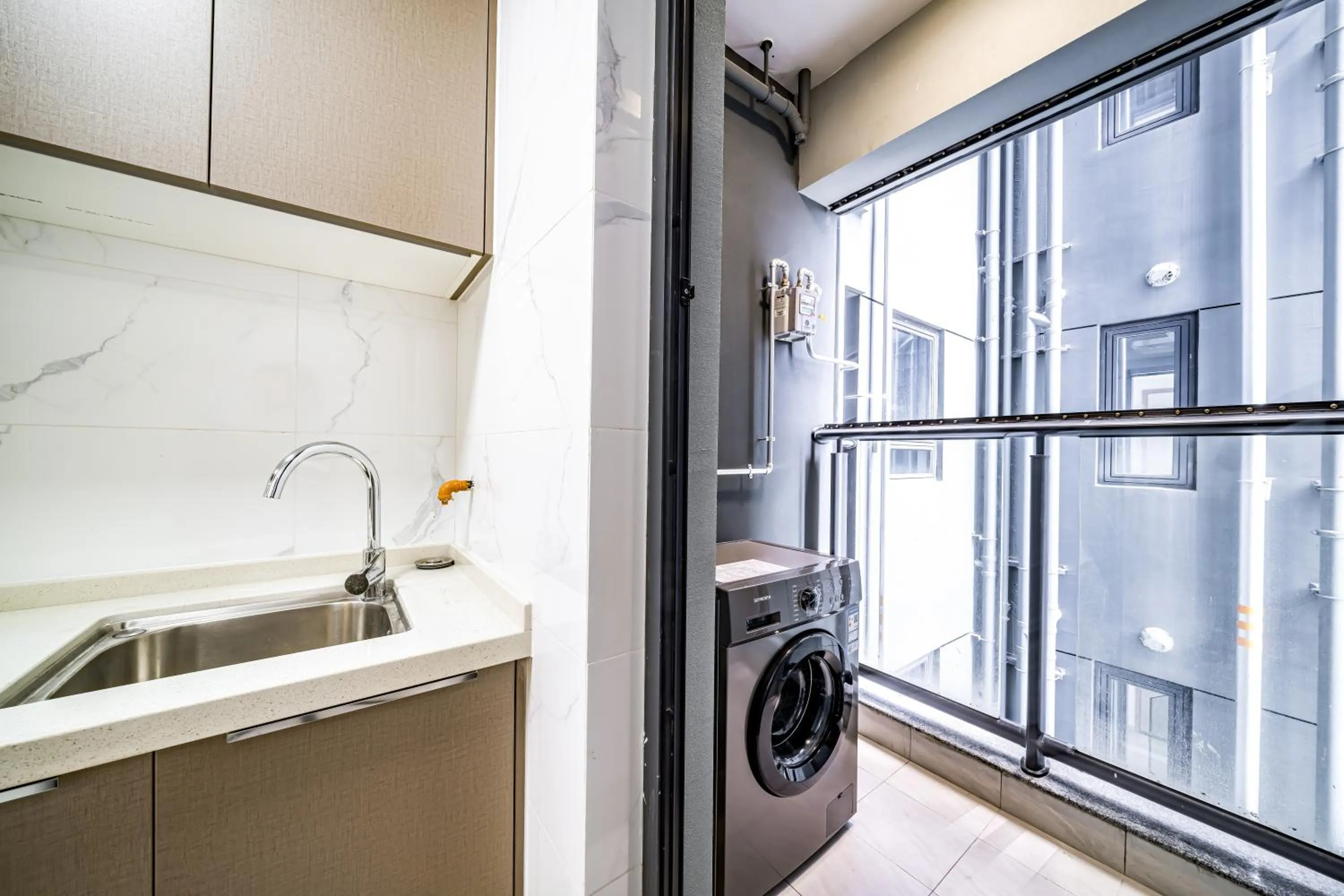 washing machine in Kingkey Shuibei International Apartment Hotel