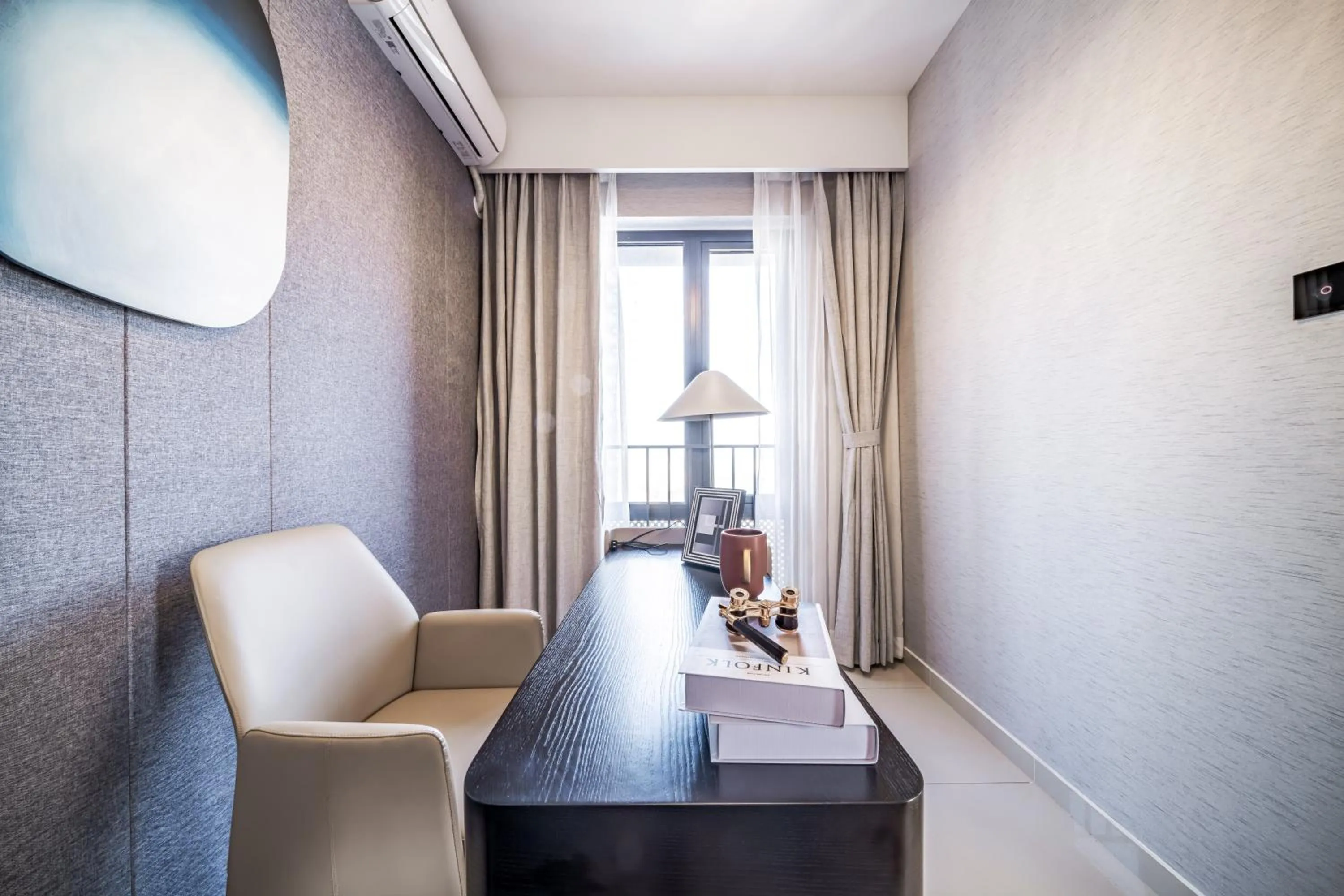 Seating area in Kingkey Shuibei International Apartment Hotel