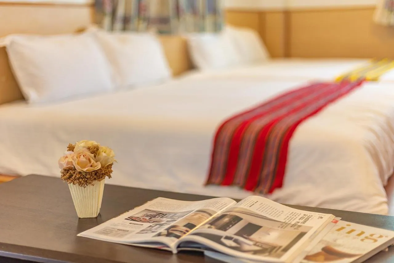 Bed in Yishin Garden B&B