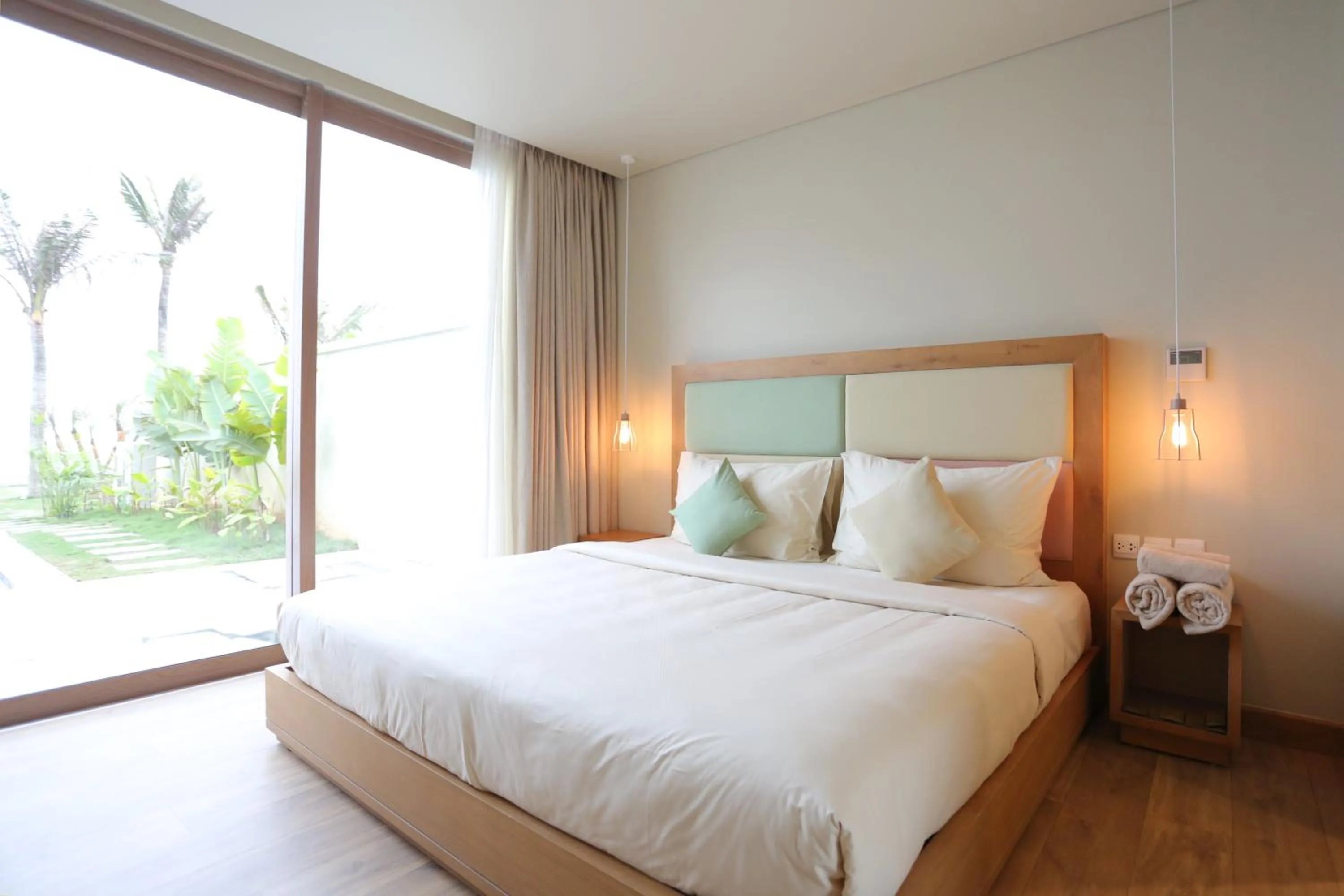 Bed in FLC Luxury Hotel Samson