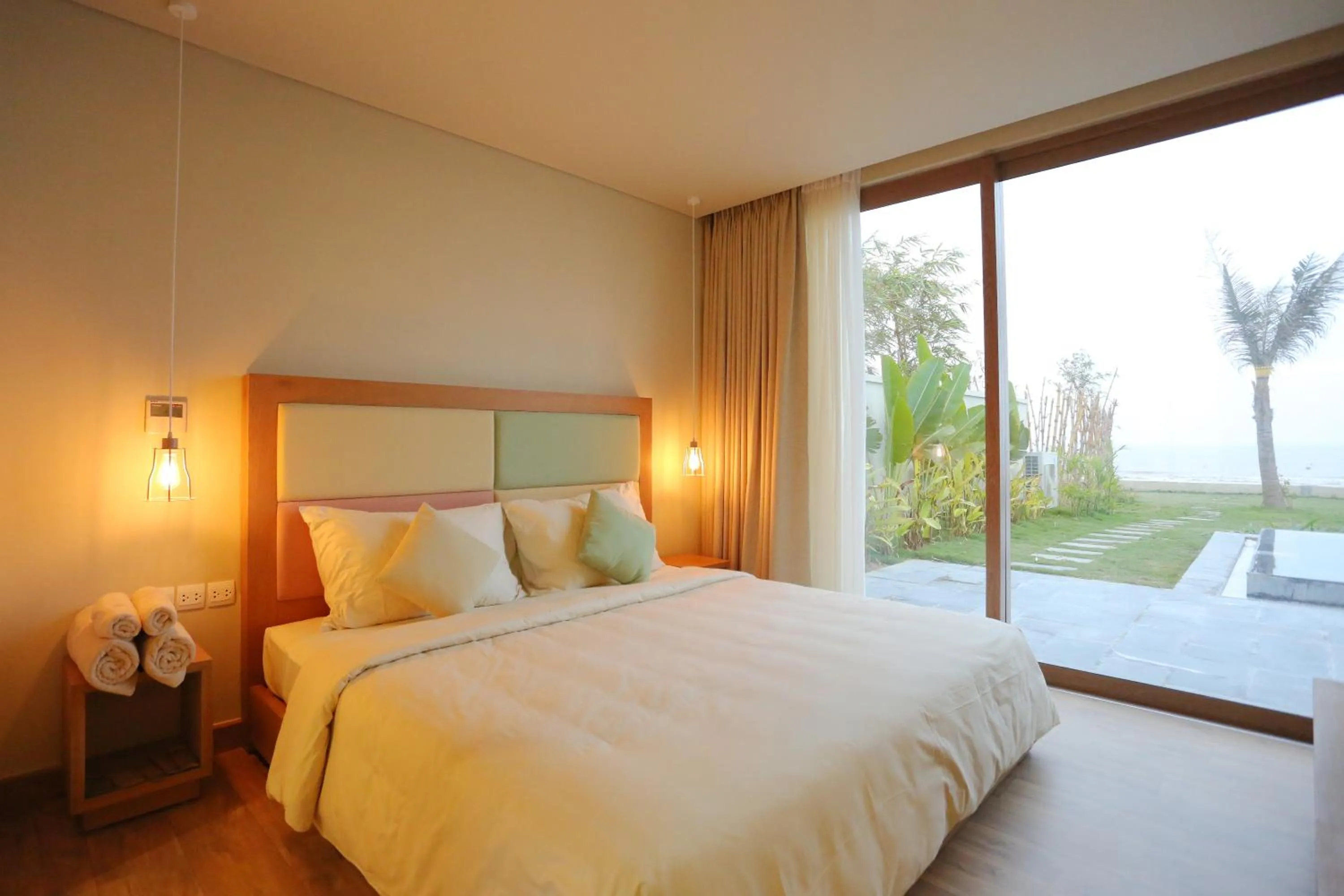 Bed in FLC Luxury Hotel Samson