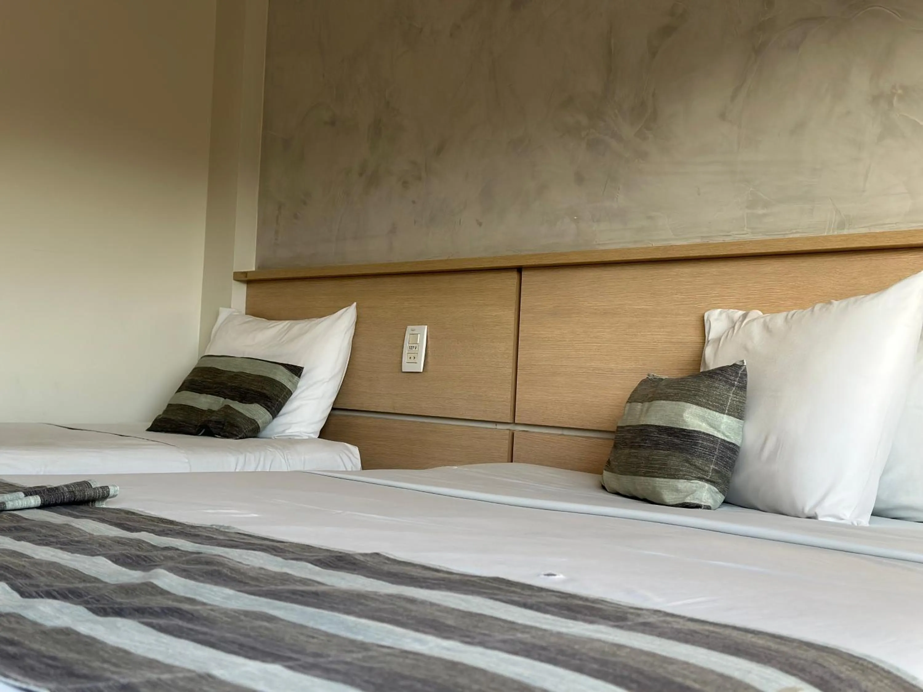 Bed in Atrium Confort Hotels