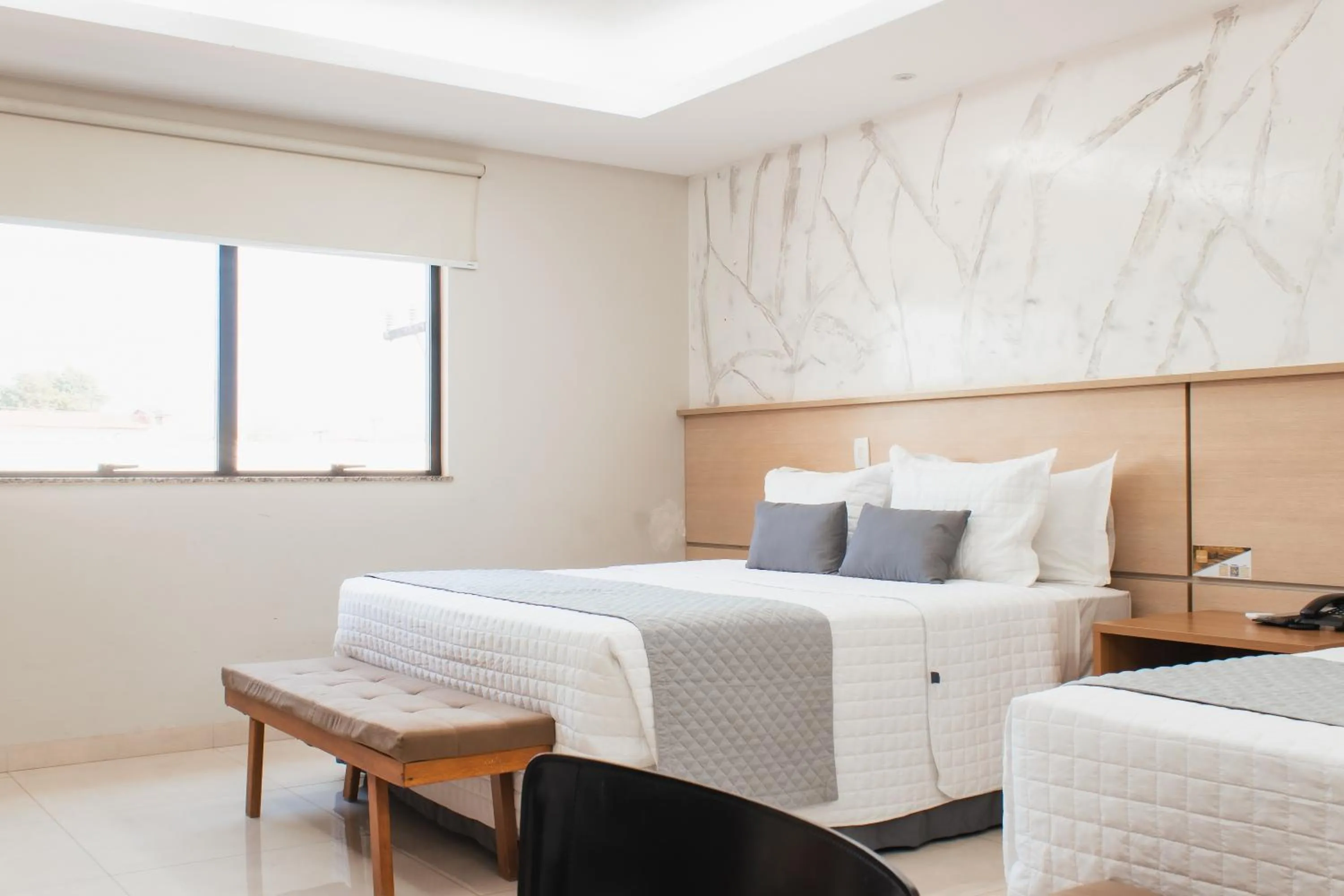 Bed in Atrium Confort Hotels