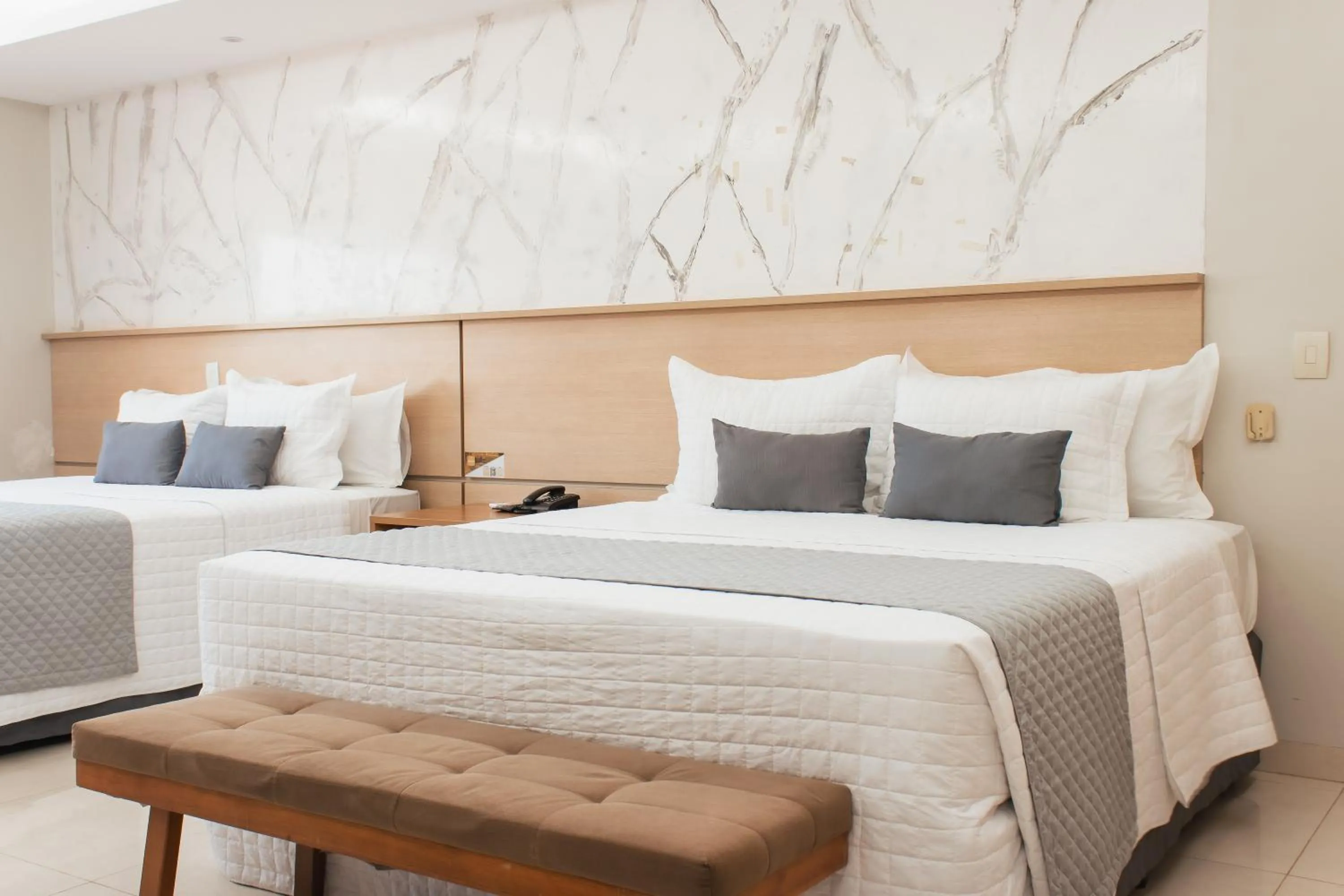 Bed in Atrium Confort Hotels