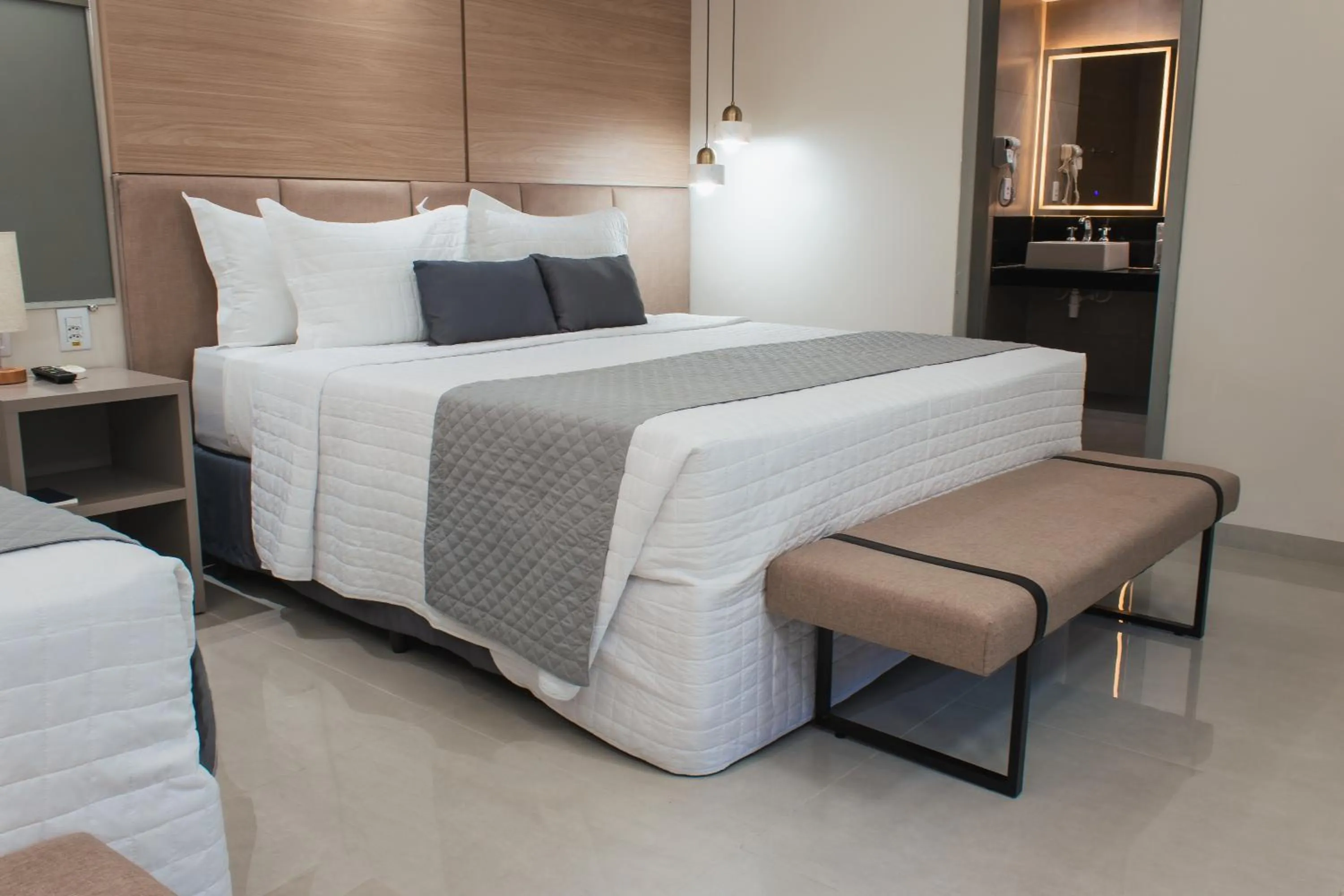 Bed in Atrium Confort Hotels