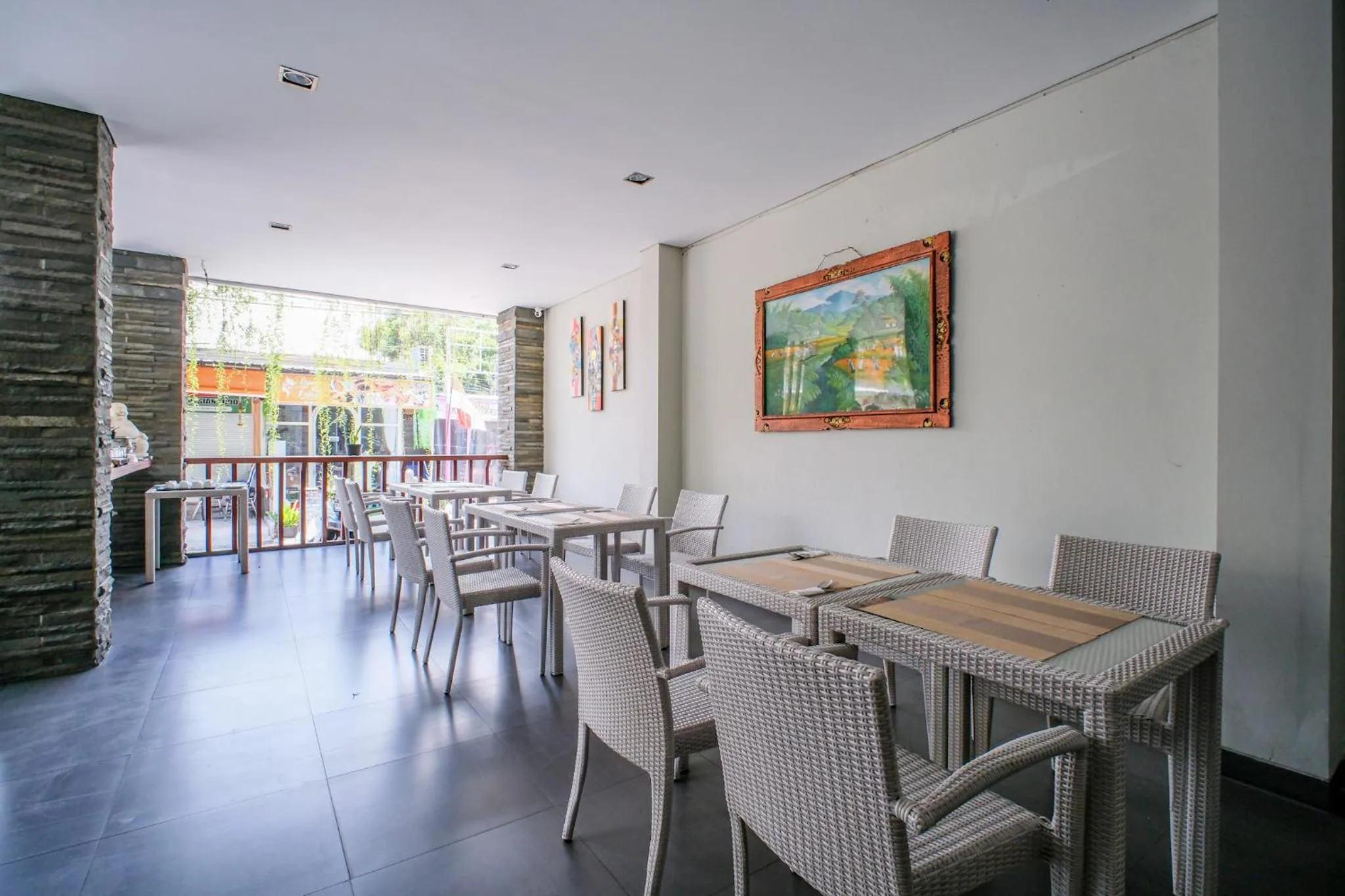 Dining area in Kamini Legian Hotel