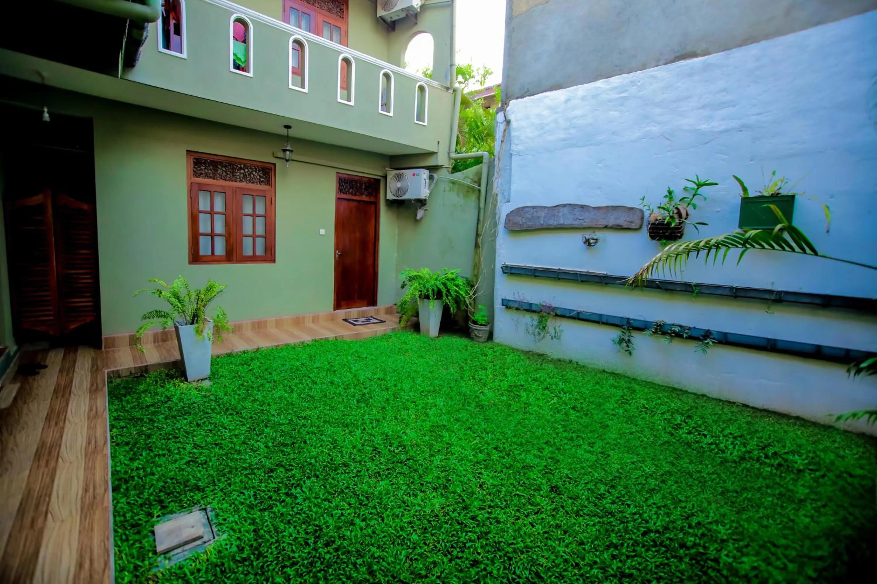 Garden view in The Frangipani motel