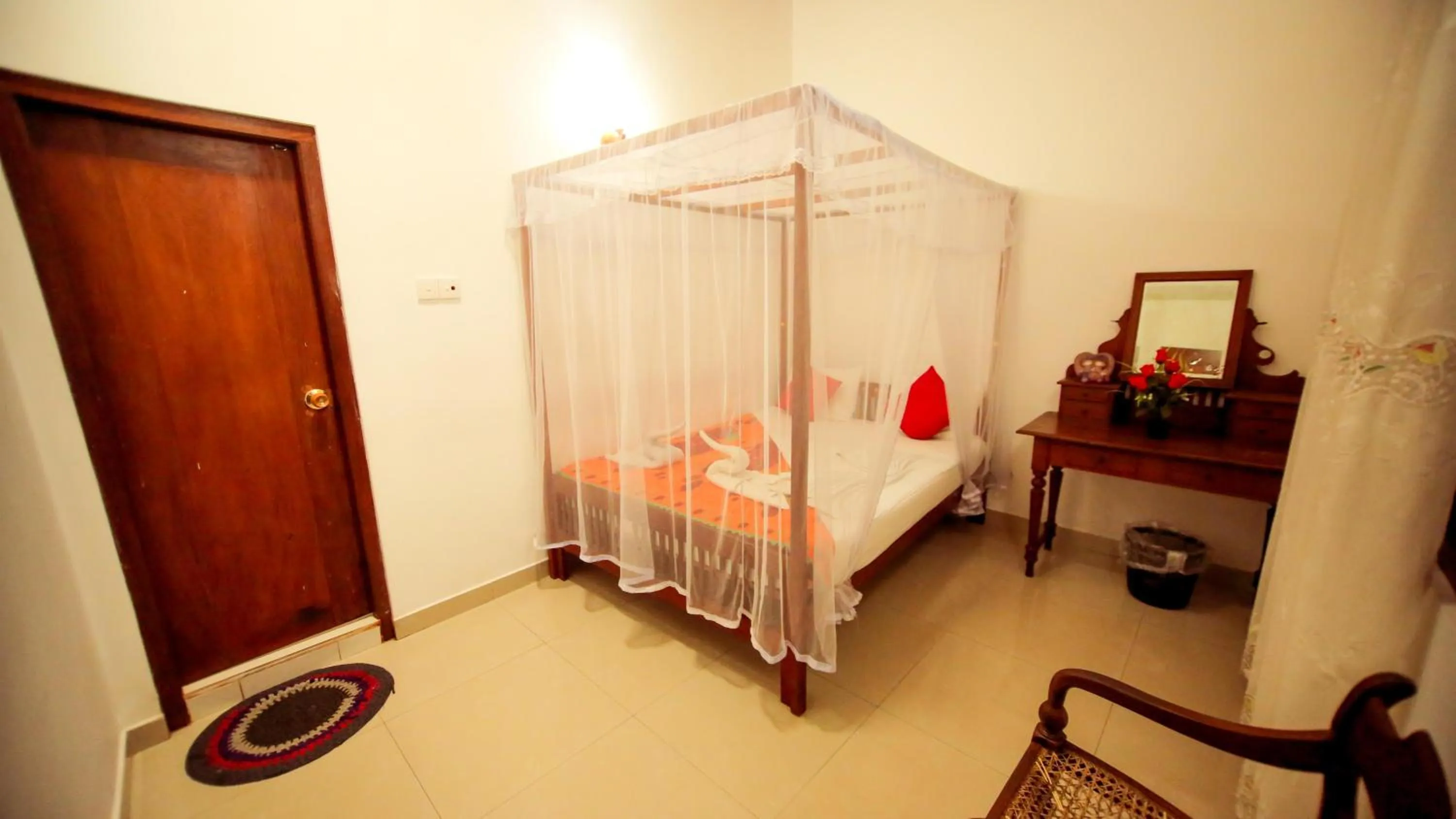 Bedroom in The Frangipani motel