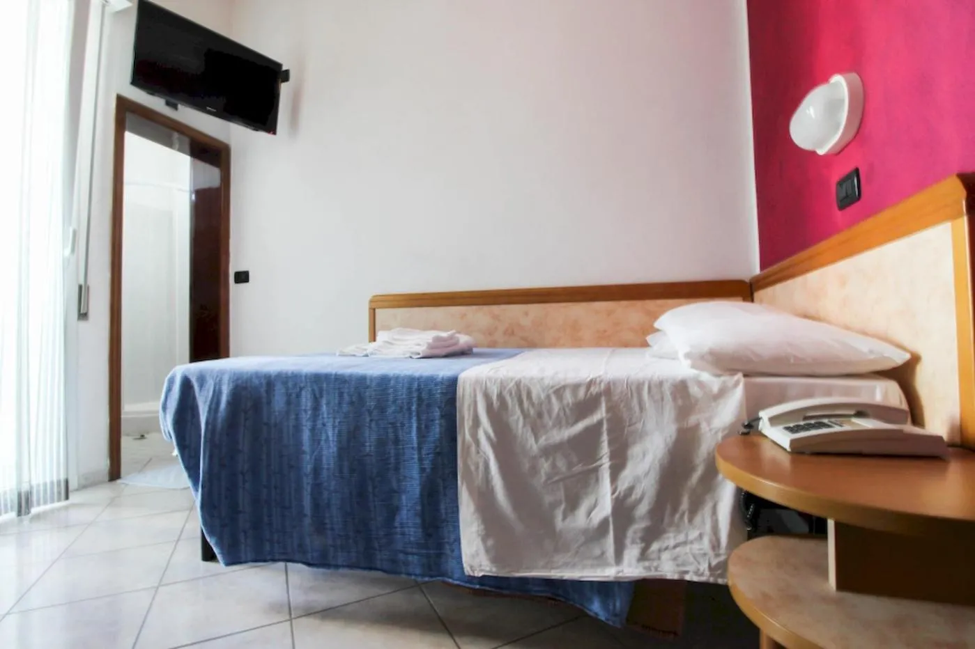 Bed in Hotel Abbondanza