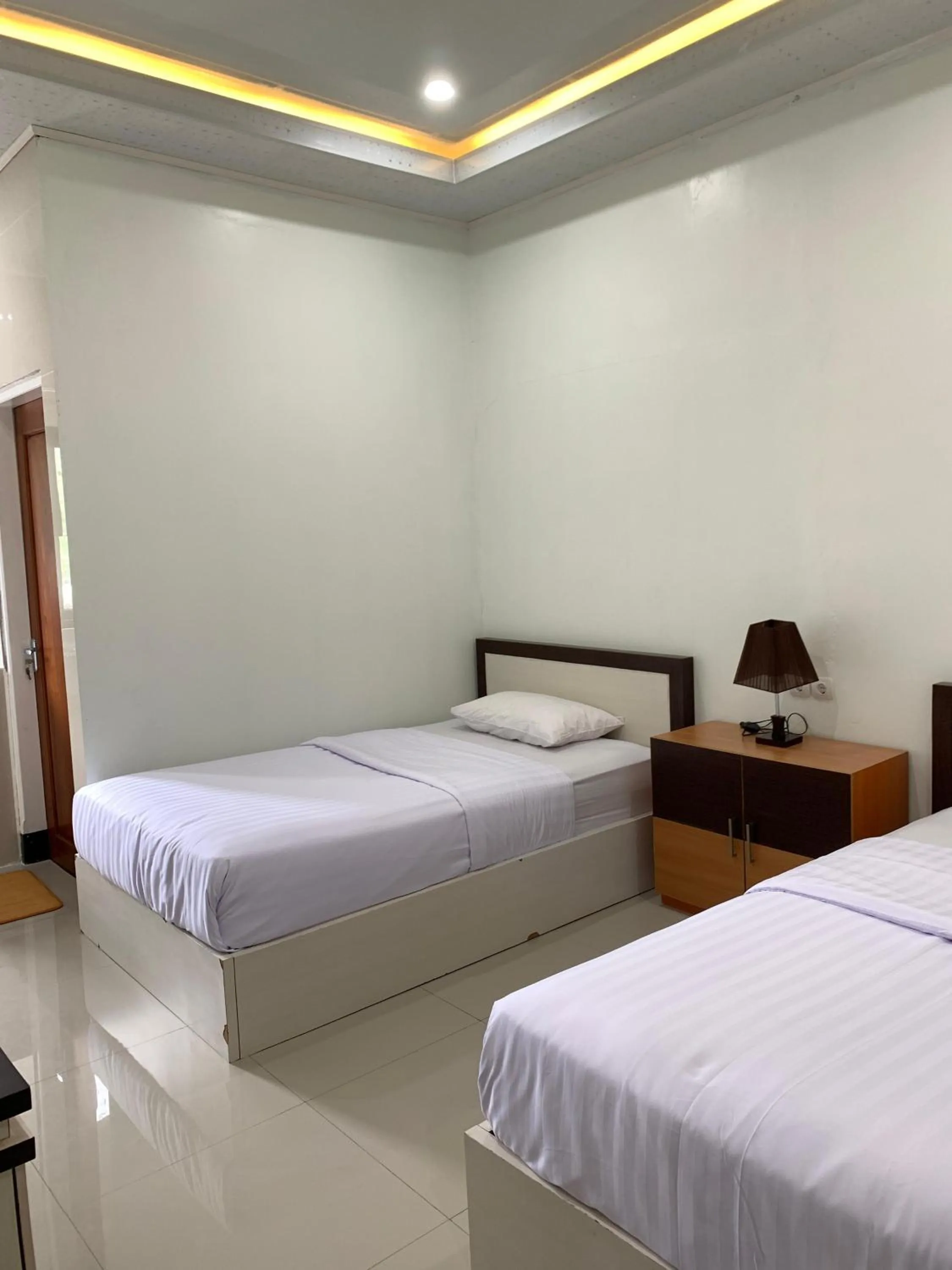 Bed in Grand Wijaya Hotel dan Villa Sarangan