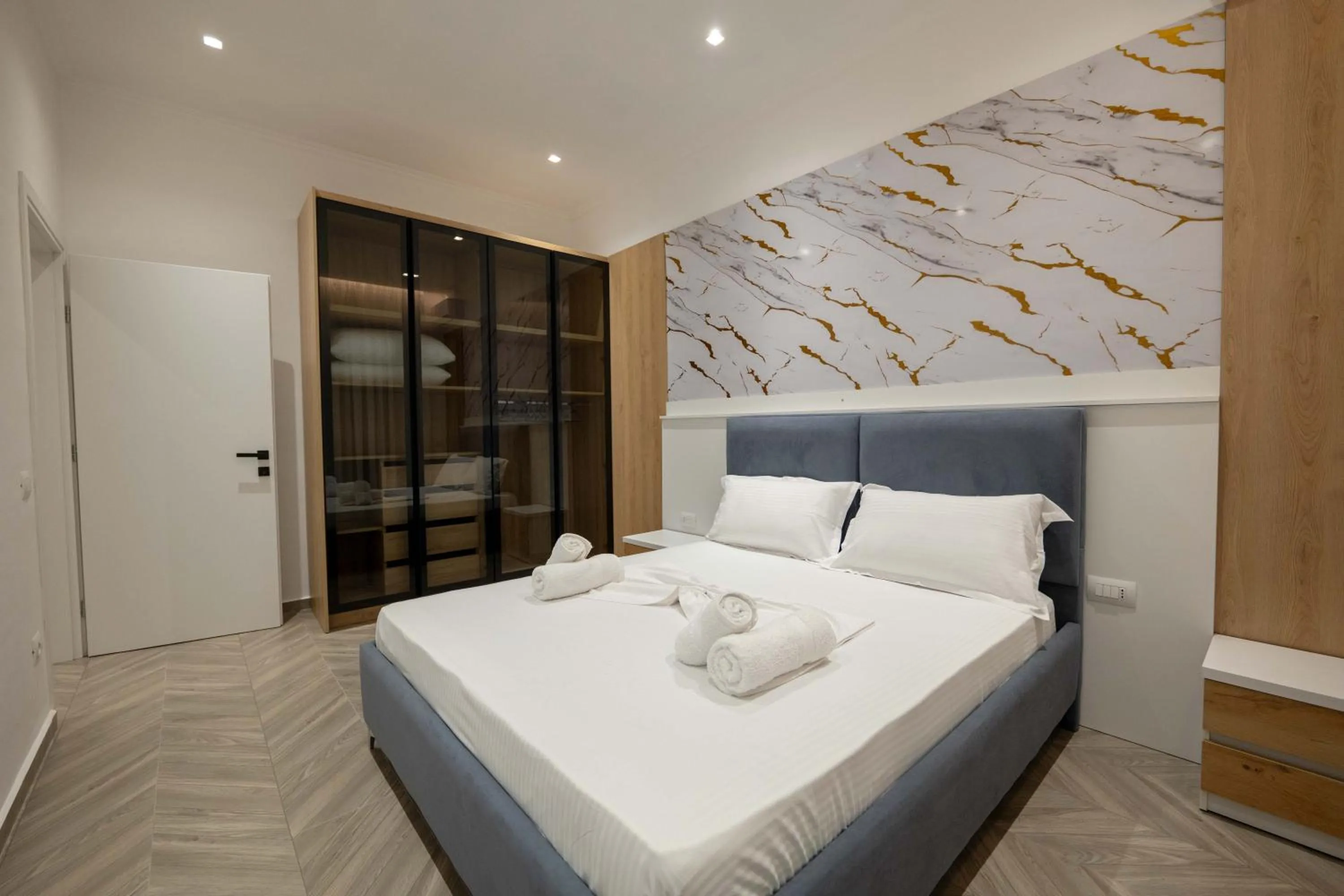 Bed in Regal Luxury Apartments
