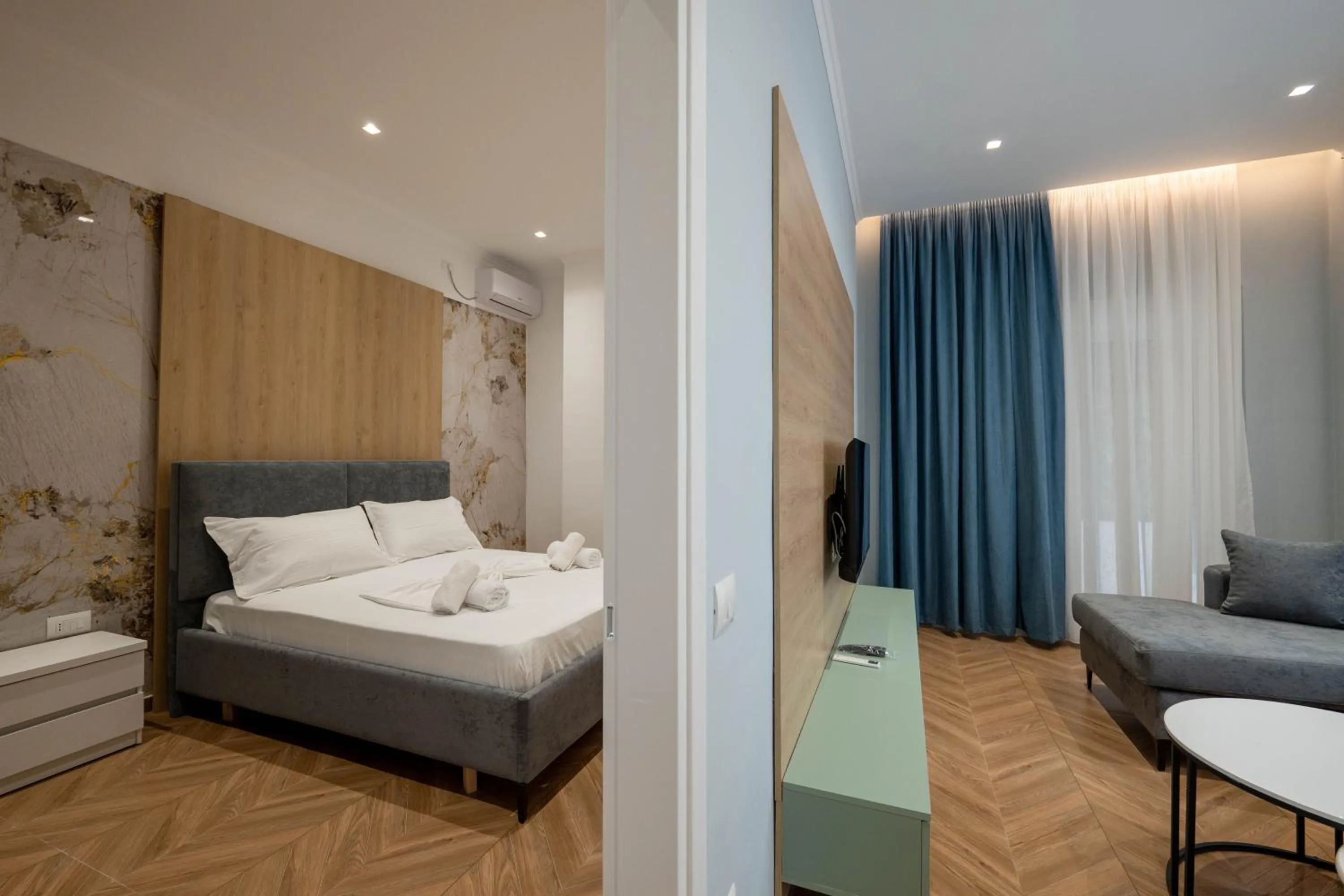 Bed in Regal Luxury Apartments