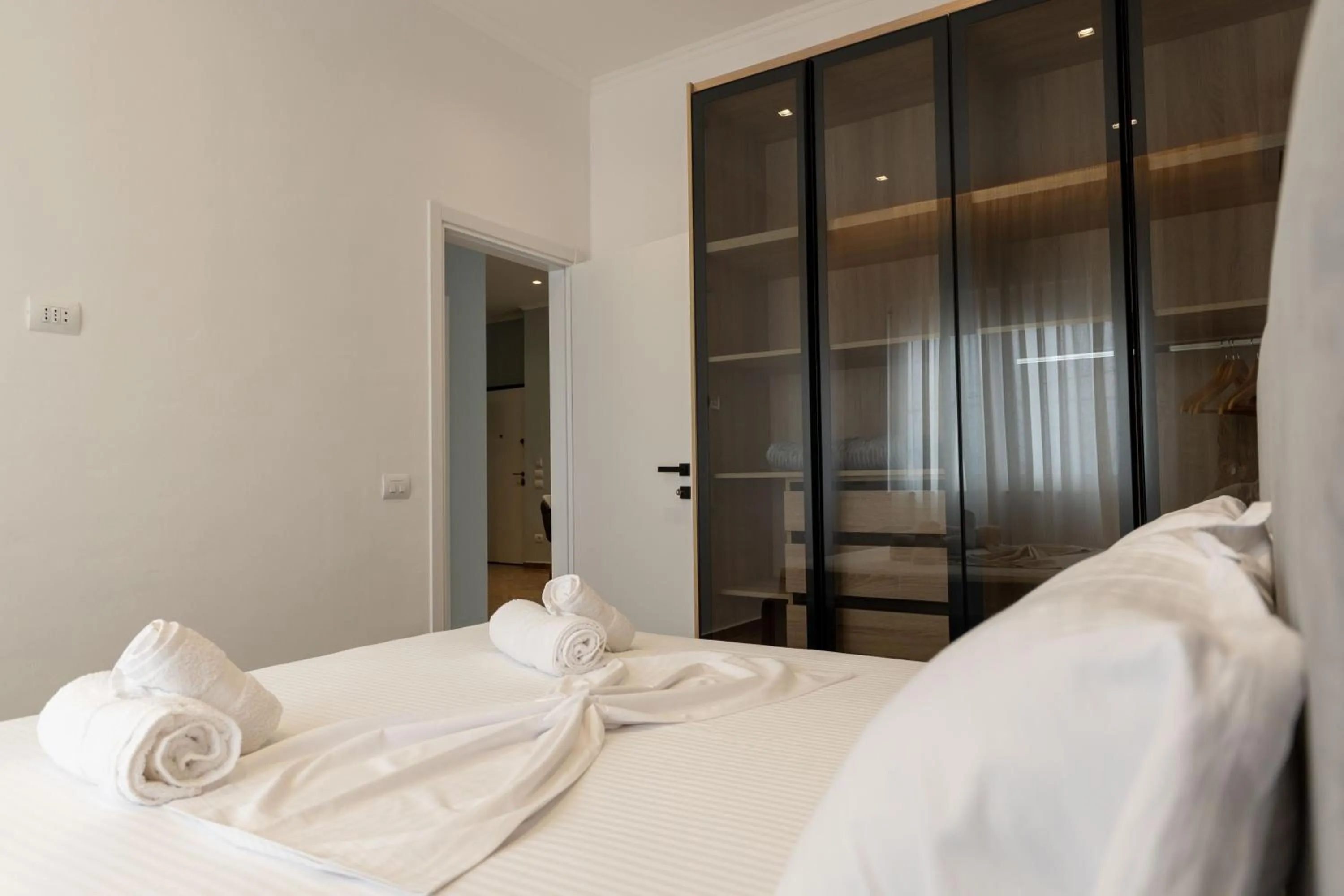 Bed in Regal Luxury Apartments